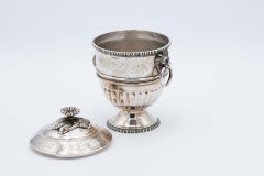 Engraved silver urn