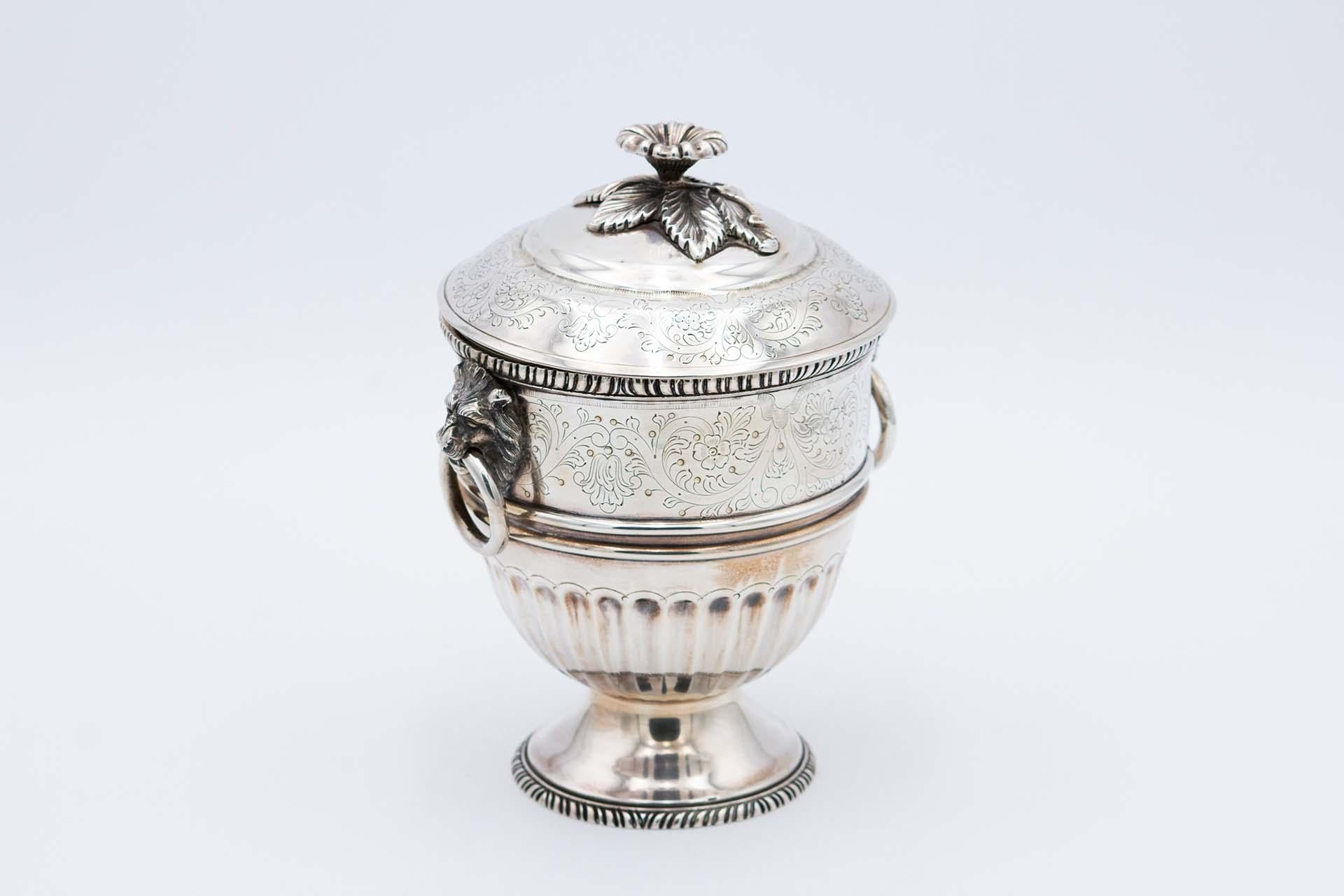 Engraved silver urn