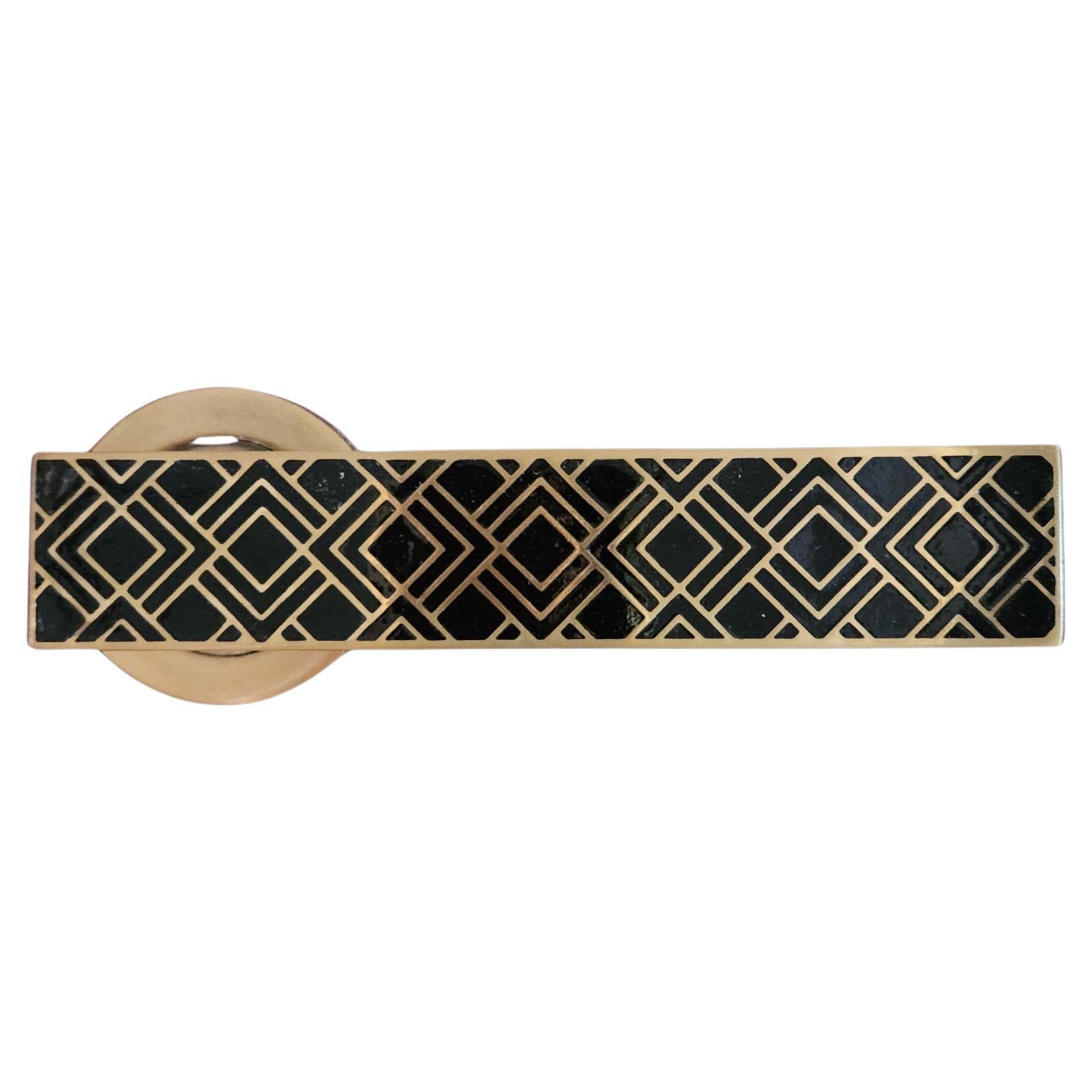 Maniglia per porta in ottone massiccio inciso della collezione Art Deco