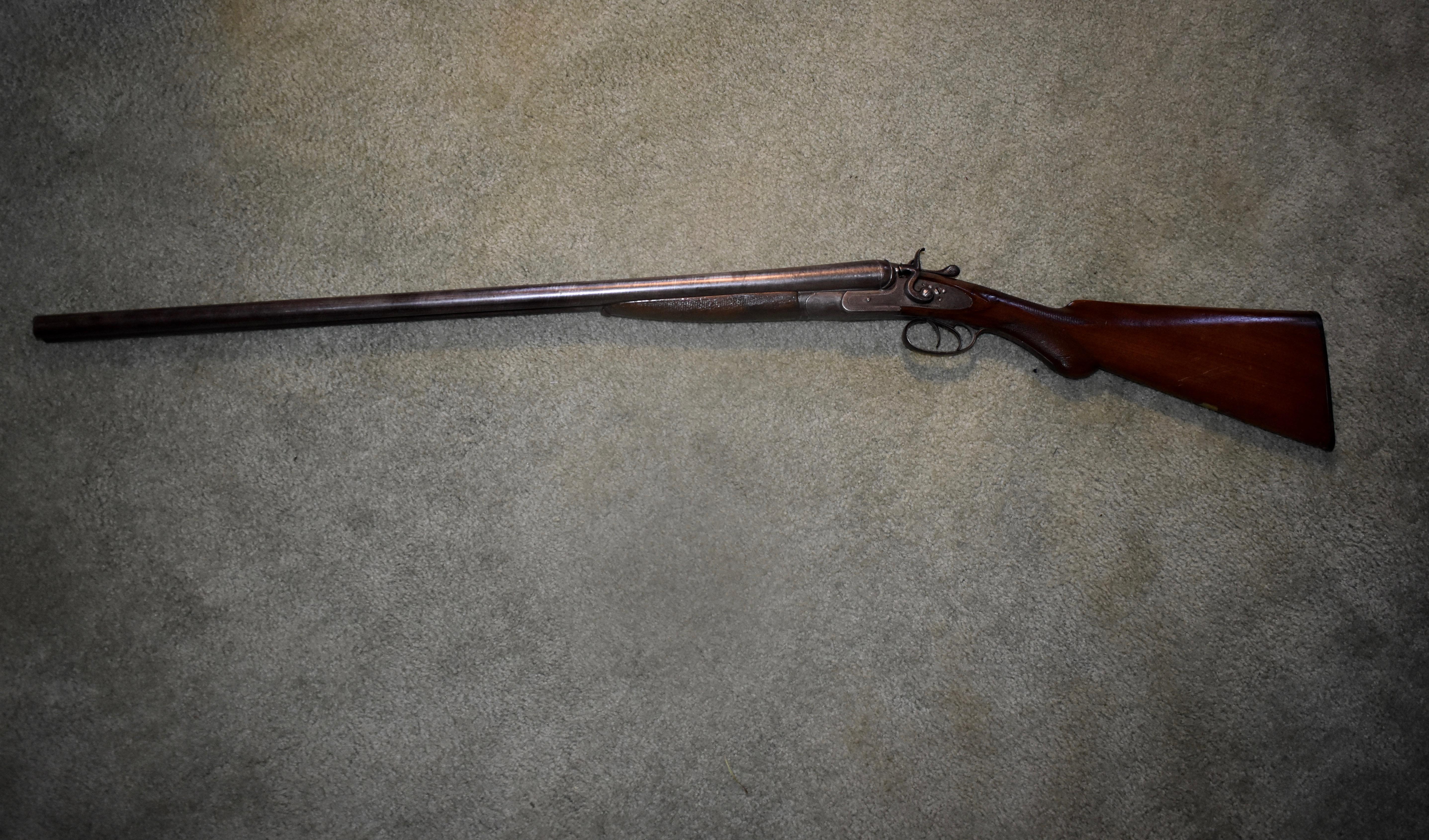 Engraved W. Richards & Co. Damascus double barrel hammer shotgun pre 1899, London. Serial number 94. All serial numbers match. Very nice condition overall with a couple areas on the stock that have minor flaws. The hammers both function and strike