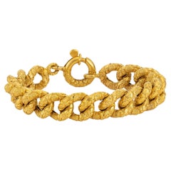 Bracelet en or jaune gravé