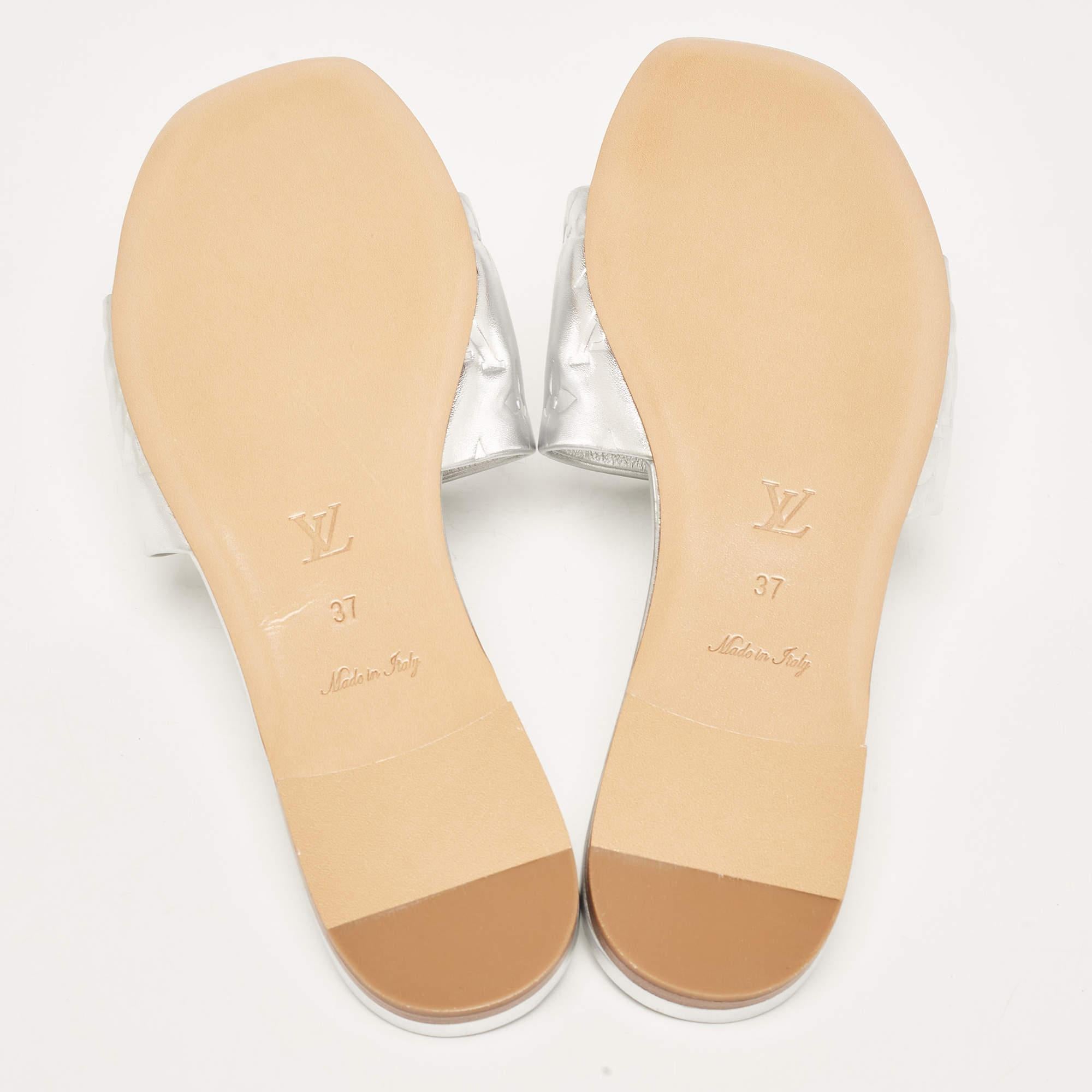 Enhance your casual looks with a touch of high style with these designer slides. 1