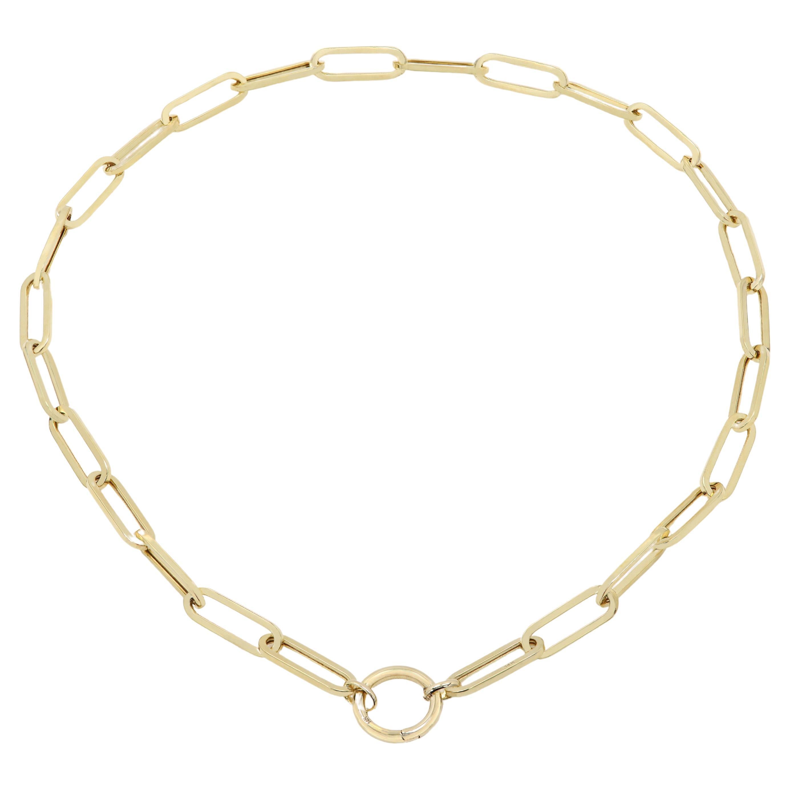 Italian Made Chain - Necklace
Large Paperclip Style  -  classic Link Chain with front Lock
Paperclip size - 7mm width 
Necklace Length: 18' Inch.
Real 14k Gold - Yellow Gold.
Approx weight total: 14.7 grams.
Enhancer Lock is all 14k Gold, Size 15mm