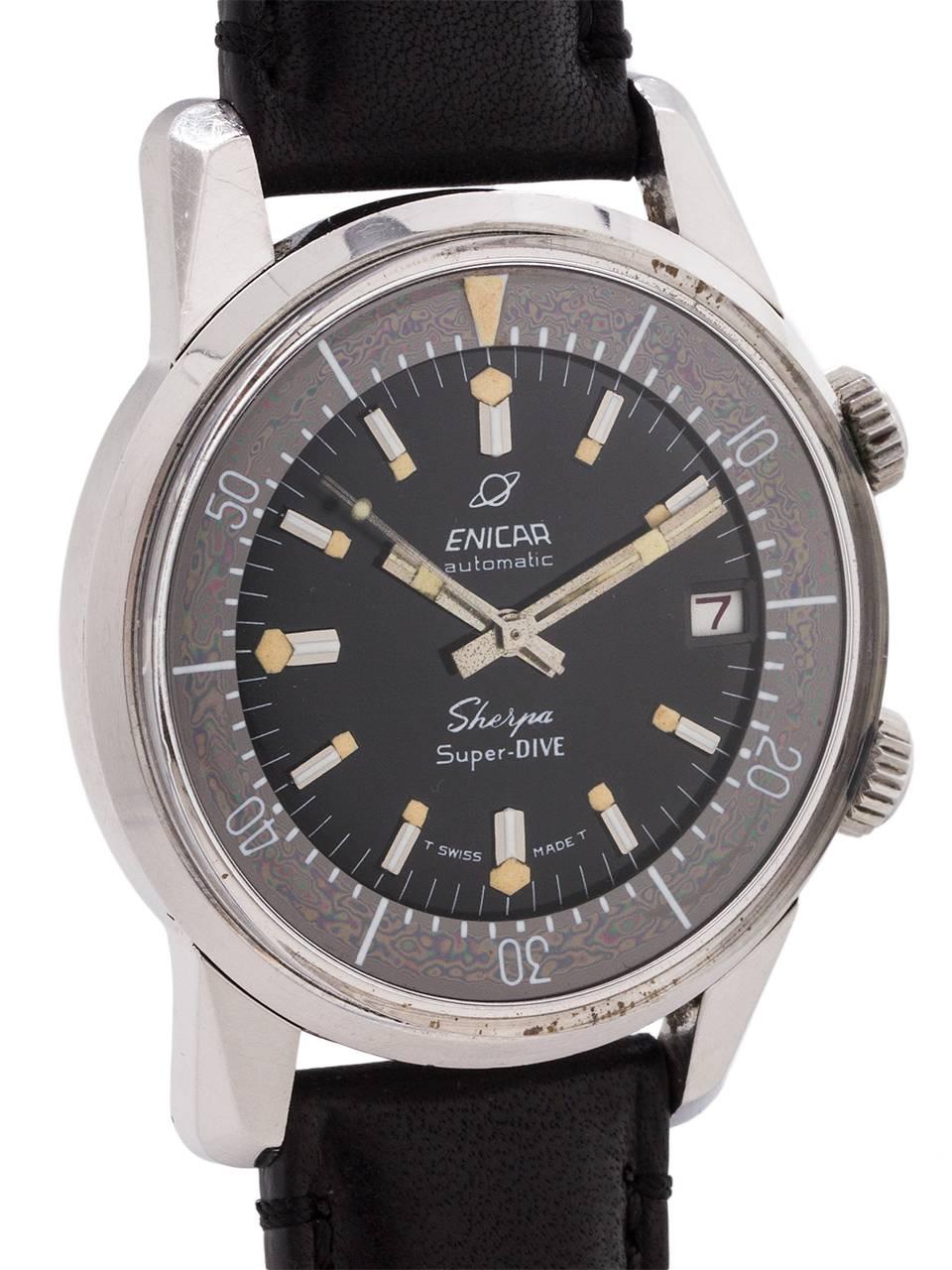 
Enicar stainless steel Sherpa Super-Dive automatic wind diver’s model circa 1970’s. Great looking 40mm water proof style case with screw down case back, smooth aged grey internal rotating bezel, and heavy angled lugs. Original matte black dial with