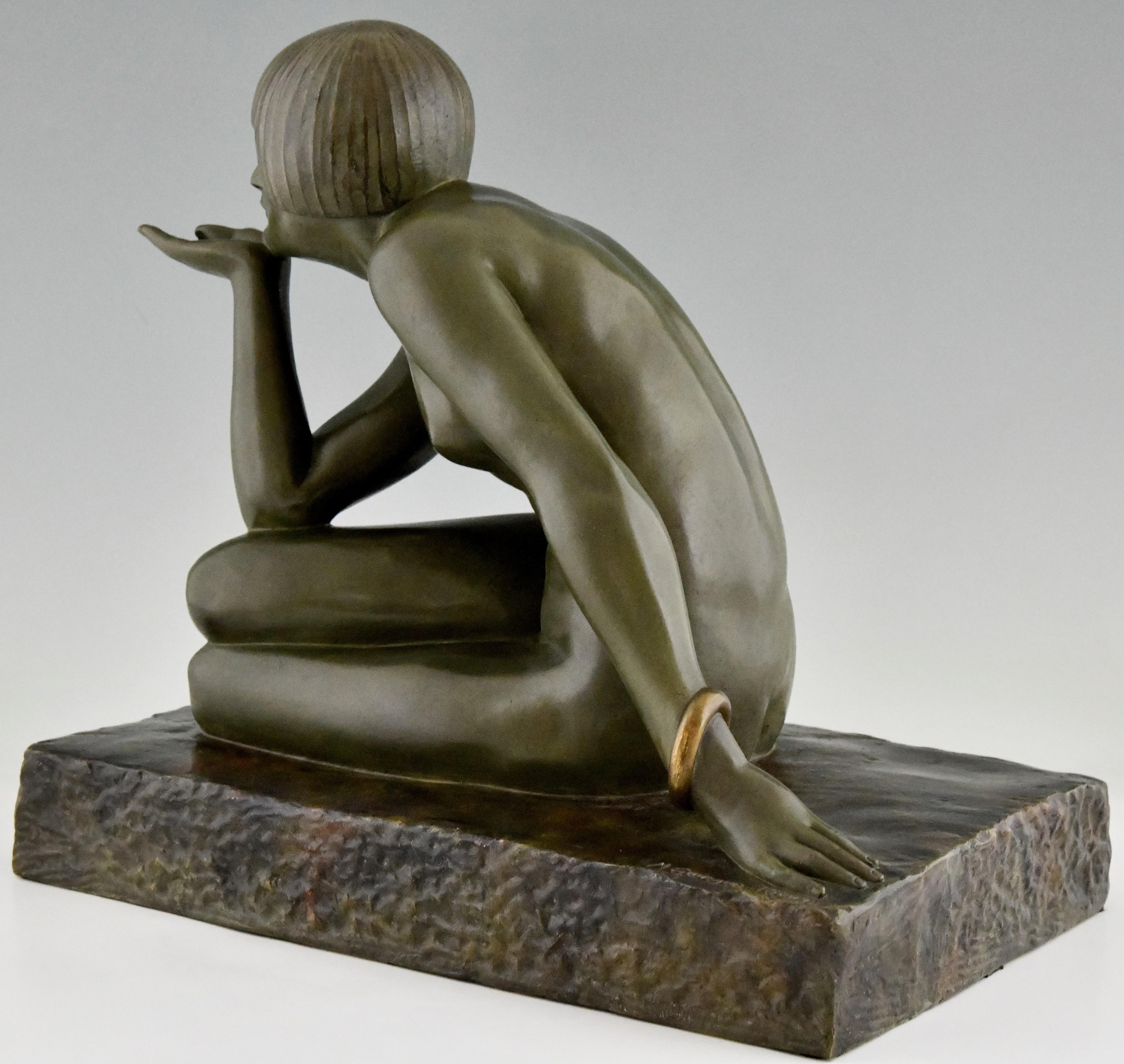 Enigma Art Deco bronze sculpture seated nude with bracelet by Guiraud Rivière In Good Condition In Antwerp, BE