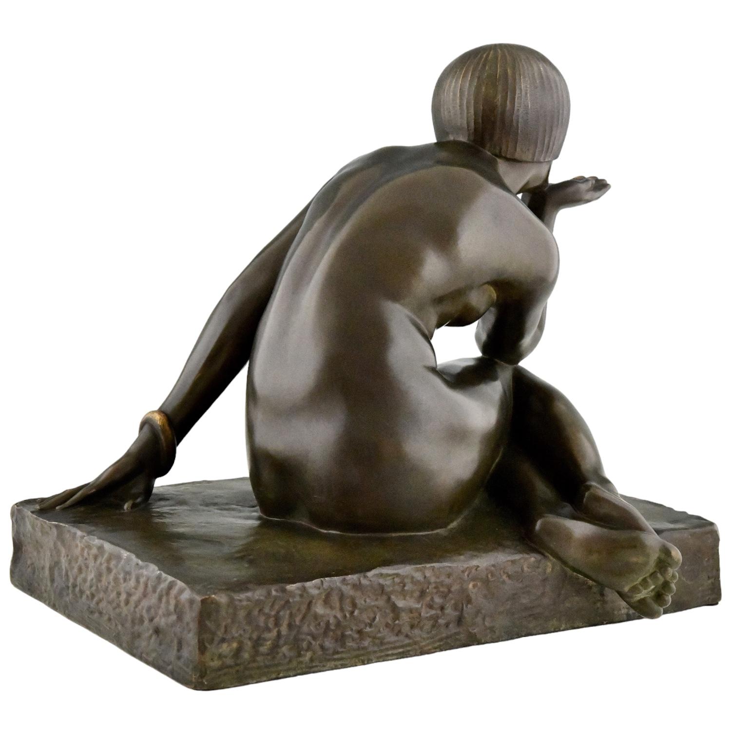 Bronzo Enigma scultura in bronzo Art Déco nudo seduto con bracciale di Guiraud Rivière in vendita
