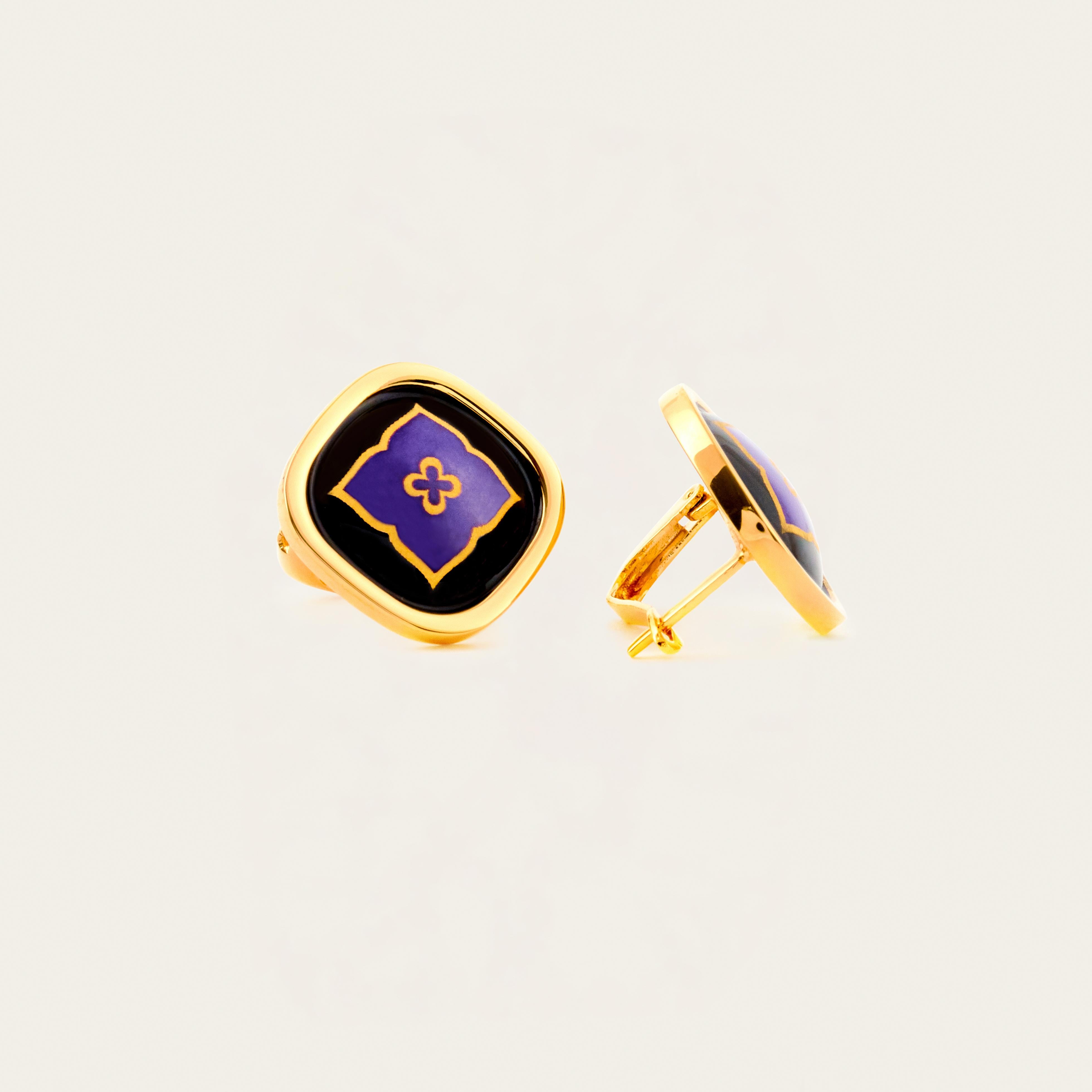 Introducing our Enigma Earring. Indulge in exquisite style with our 18k gold-plated stainless steel earrings. Hand-painted with vibrant fire enamel, these hypoallergenic earrings are a true masterpiece of luxury and beauty. Shop now and elevate your