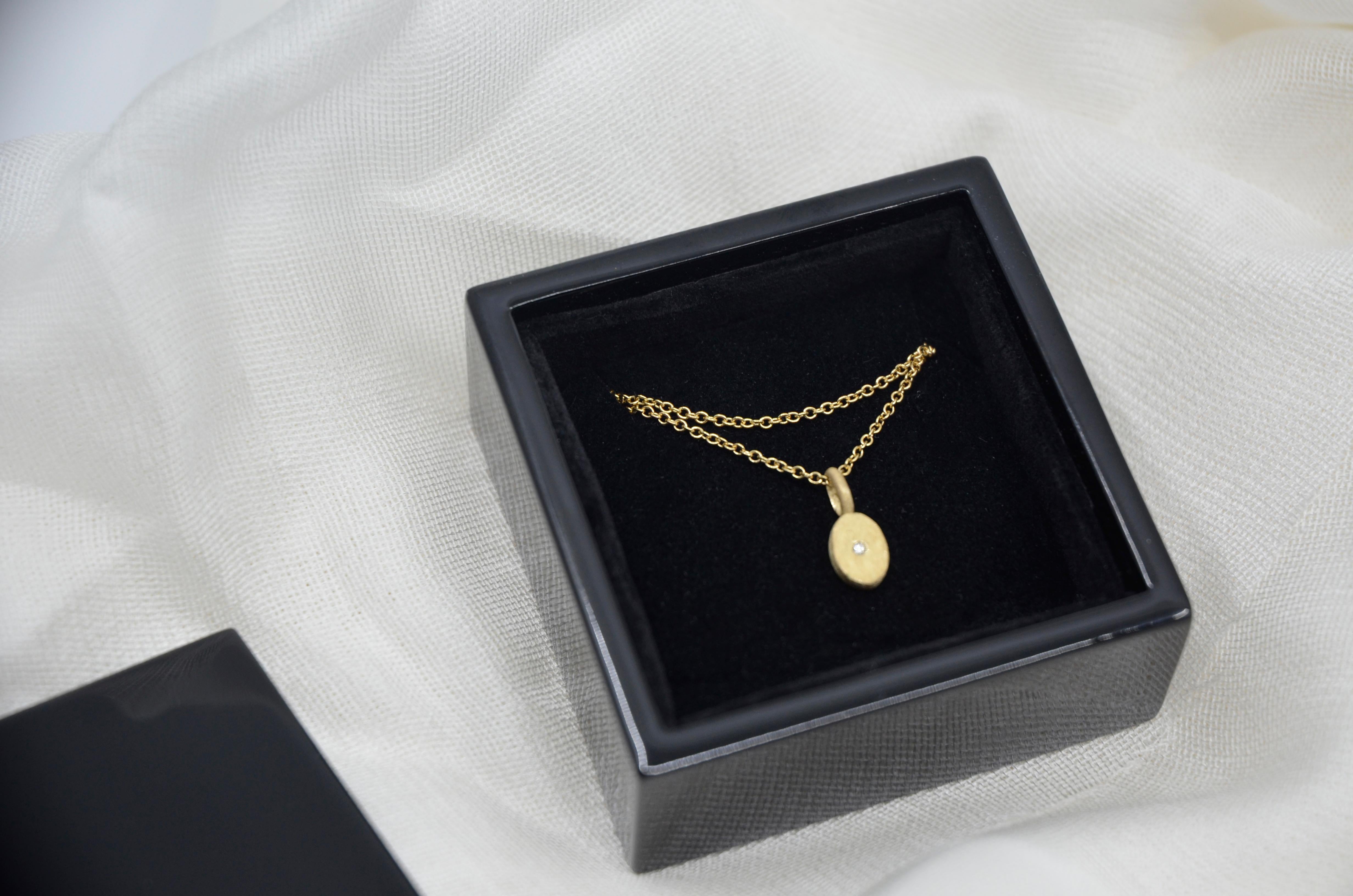 Handcrafted by local goldsmiths in Milan, Italy.

18-carat yellow gold 
1 cm
White diamond 0,10ct 

Comes with custom Japanese lacquered wooden jewellery box. 
The piece can be made to order with a lead time of approximately 4-5 weeks. Each jewel is