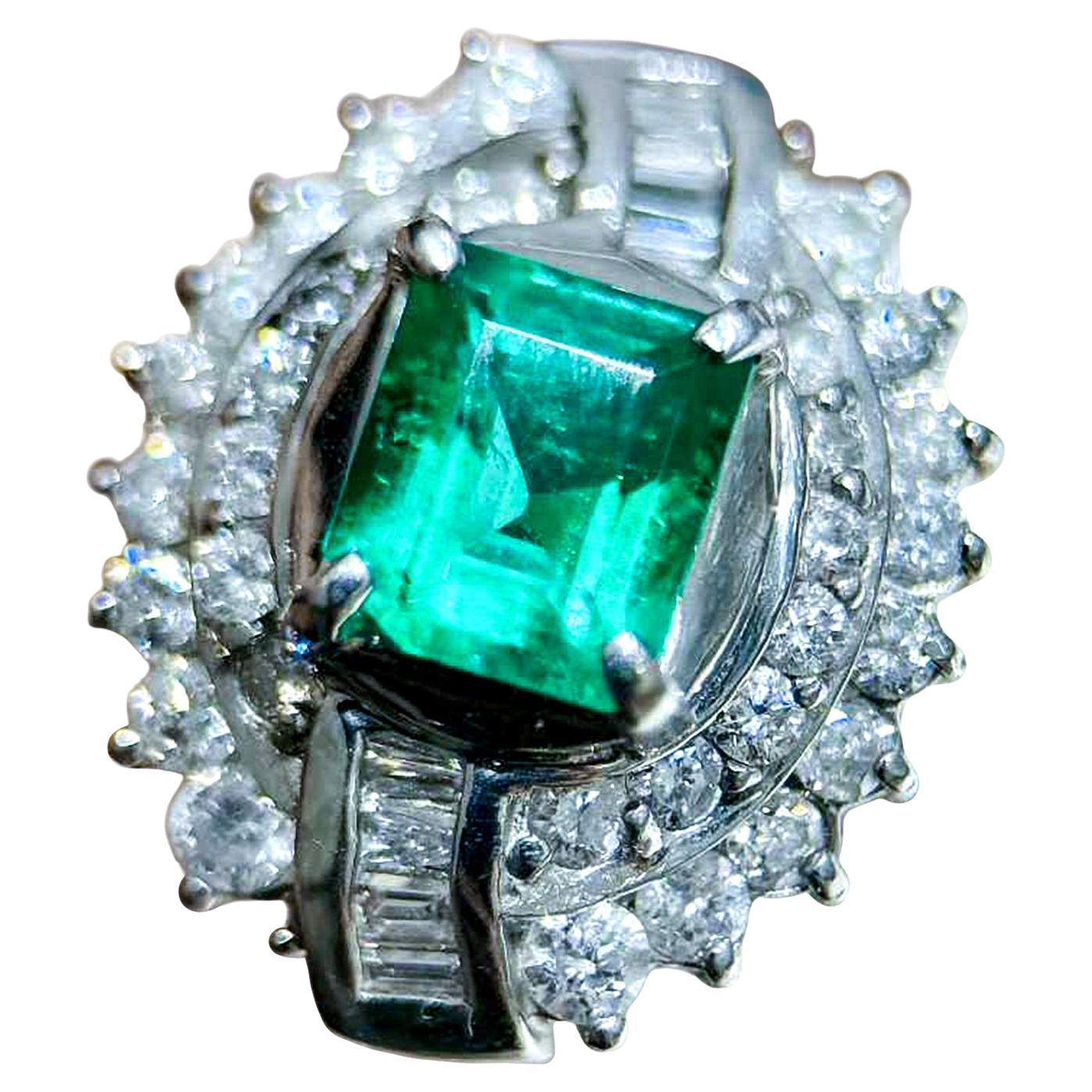 【Énigma】GUILD Certified Muzo Colombian Emerald Halo Ring — 0.816ct Vivid Green