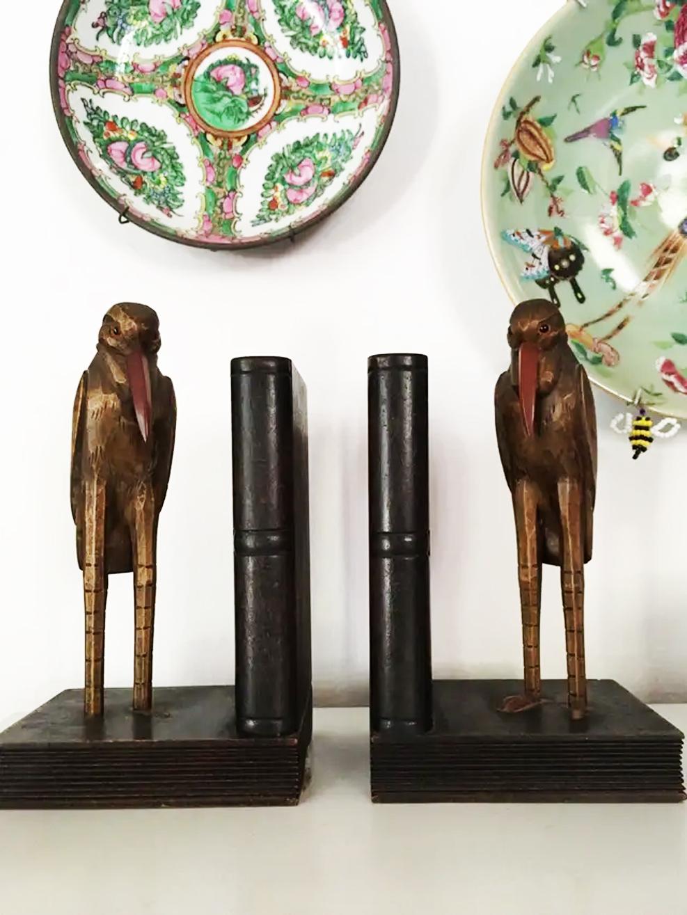 Antique enigmatic Bookends, Humanized Ravens, Carved in Wood with Glass Eyes 
It has a cylinder-shaped iron counterweight inside the books, to guarantee its stability.
Very special, they could be unique pieces or very difficult to find. They are