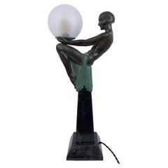 Enigme Art Deco Style Nude Sculpture on top of an Obelisk Lamp by Max Le Verrier