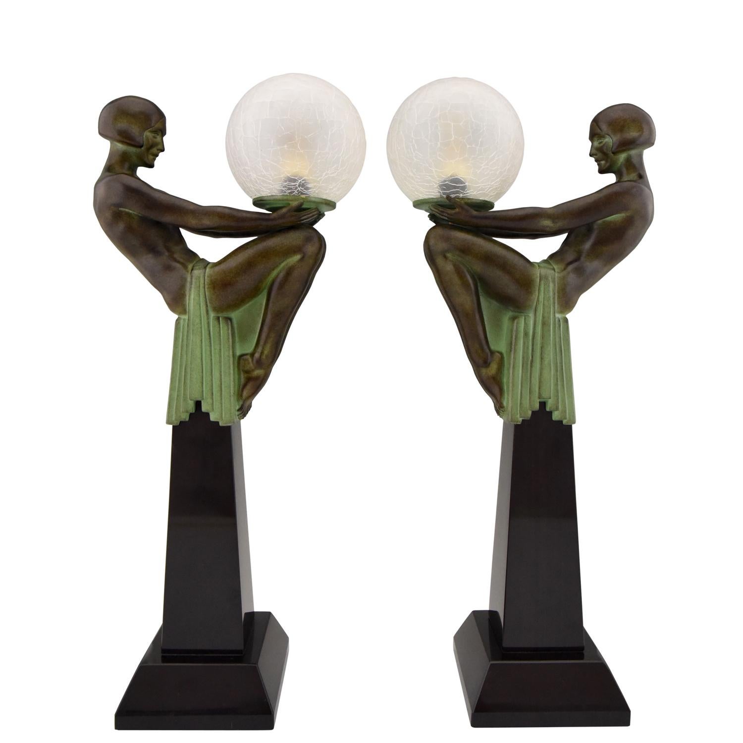 Art Deco style lamp nude holding a globe ENIGME signed Max Le Verrier with foundry mark. Design ca. 1930. 
Posthumous contemporary cast at the Le Verrier foundry in Paris.
Patinated Art Metal on a Black marble base, glass globe.
With Certificate of