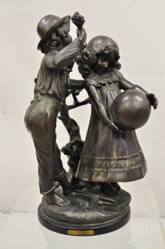 Sculpture de statue garçon et fille en bronze d'après Auguste Moreau