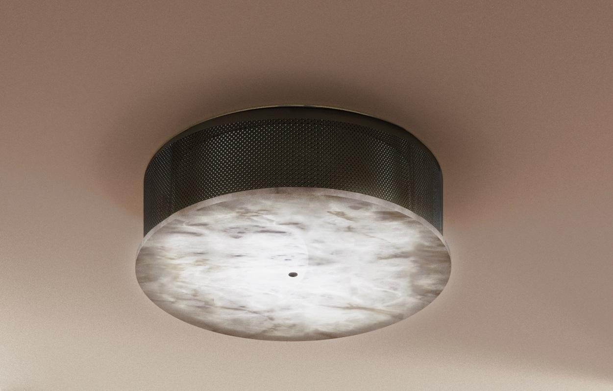 Enkō Brushed Black Metal Ceiling Light by Alabastro Italiano
Dimensions: Ø 34,5 x H 9,2 cm.
Materials: White alabaster and brushed black metal.

Available in different finishes: Shiny Silver, Bronze, Brushed Brass, Ruggine of Florence, Brushed