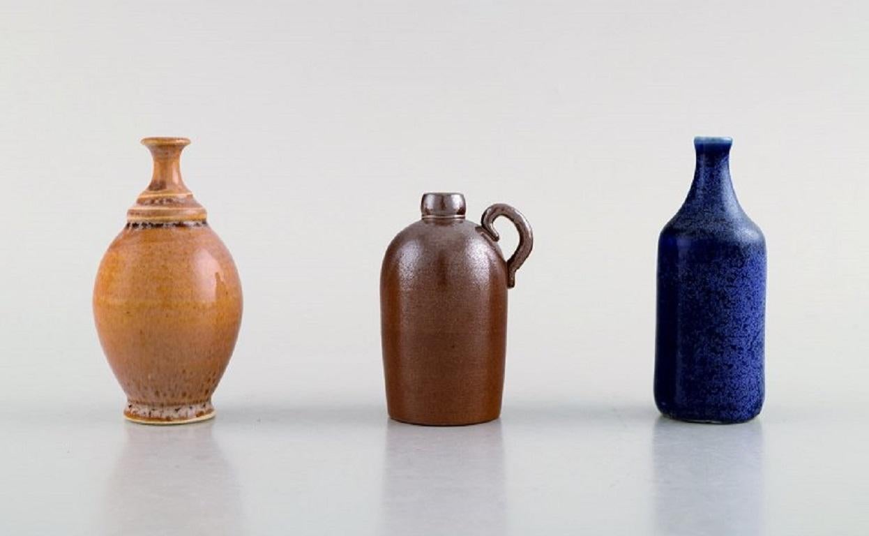 Enköping and Munk Keramik among others. 
Swedish ceramics. Collection of 11 miniature vases in glazed ceramics. 1970's.
In very good condition.
Stamped.
Largest measures: 8.8 x 5 cm.