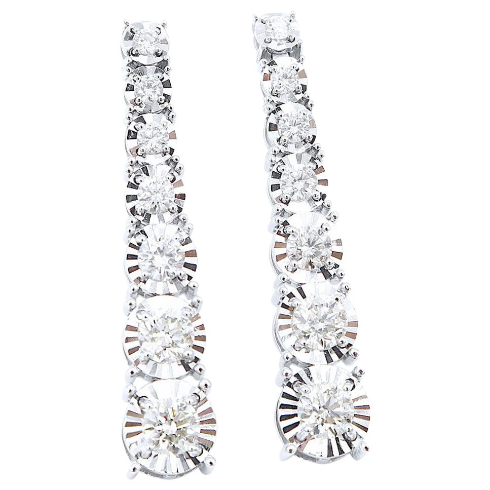 Enlarging Effect Ascending Size Diamond Earrings in 18 Karat White Gold For Sale