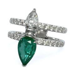 Enlightenment Double Row Emerald and fancy cut diamond ring in white gold