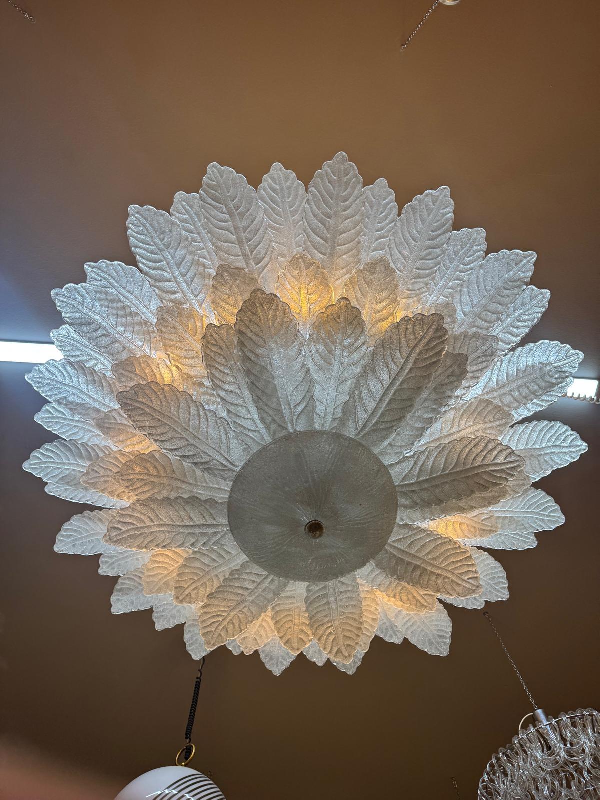 Huge Murano glass chandelier created and produced by Murano masters. The chandelier features a mighty metal frame holding 72 Murano glass leaves weighing about 1200g each. All leaves and glass present are intact.