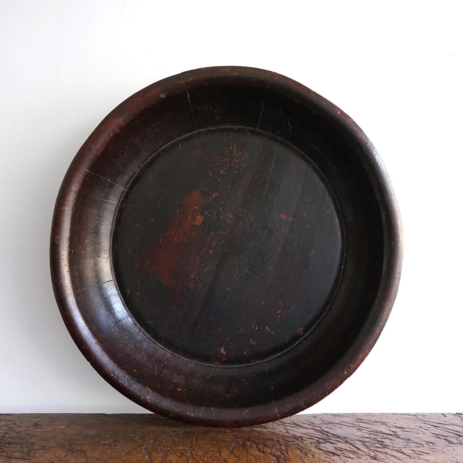 Very Large Antique Chinese Wooden Bowl, 19th Century

We have had a few suggestions for its original use from grain and rice to dough and laundry. Perhaps it was always destined to be multi-use.

It works well in the middle of a large rustic dining