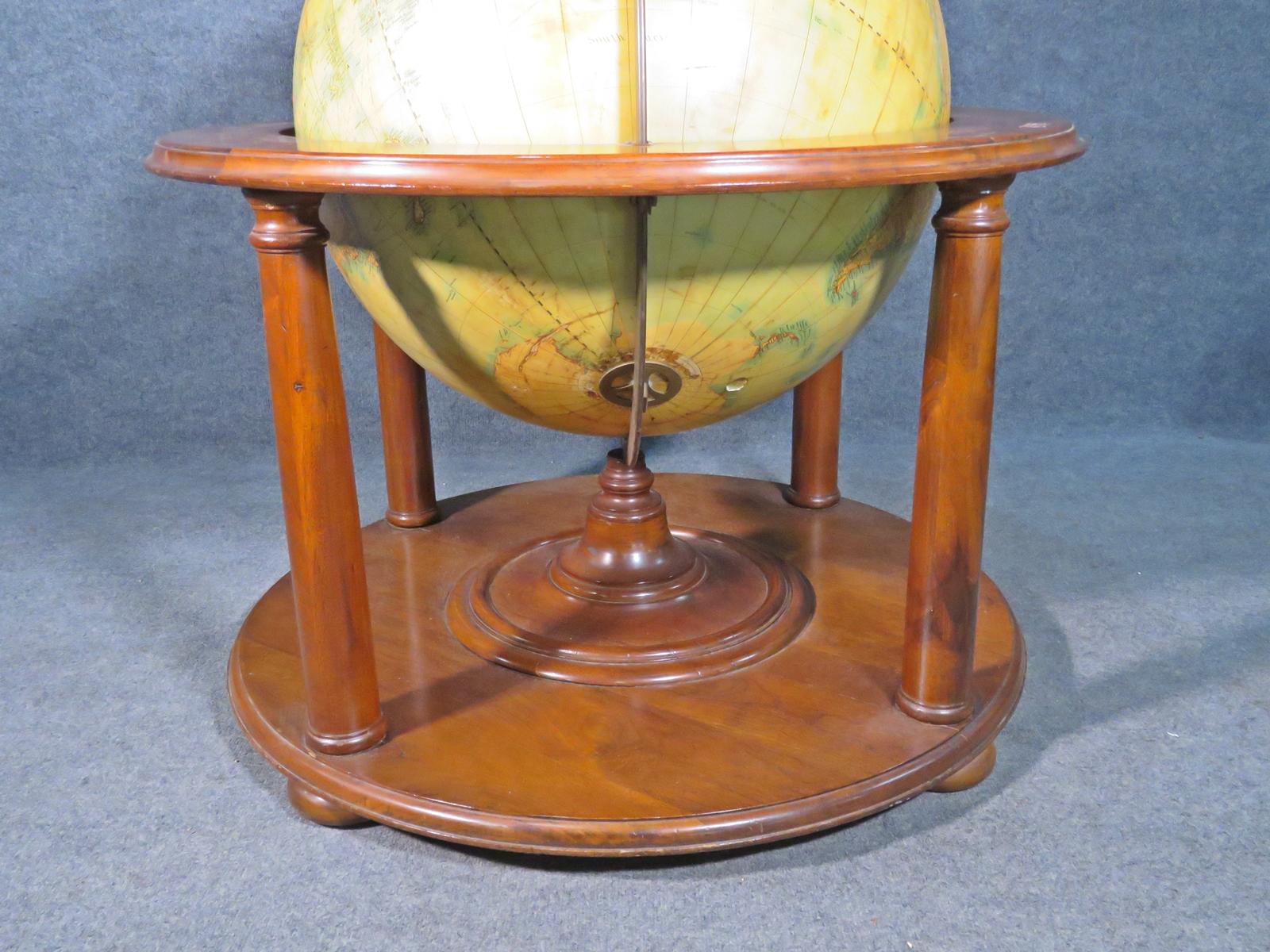 antique world globes on stand