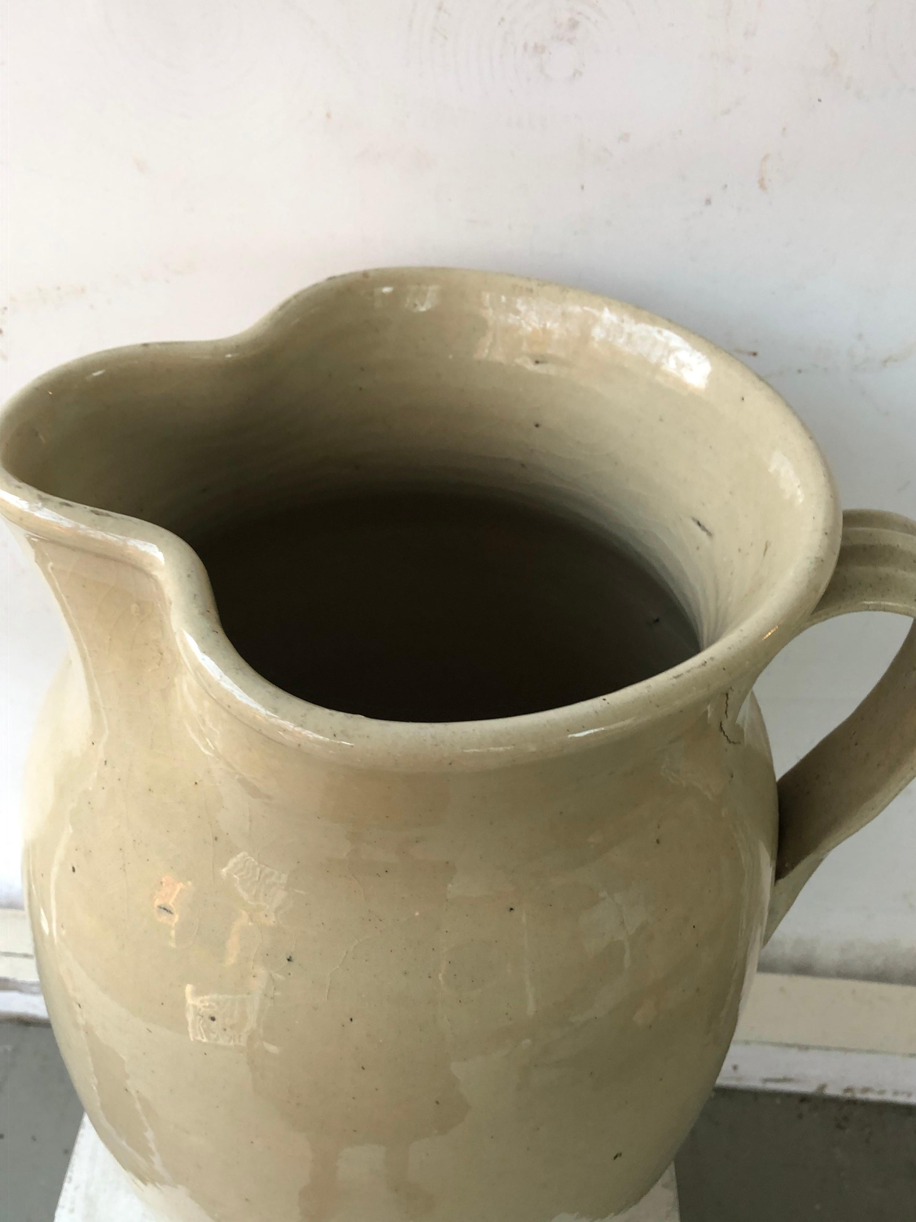 Mid-19th Century Enormous Cream Glazed English Pottery Pitcher For Sale
