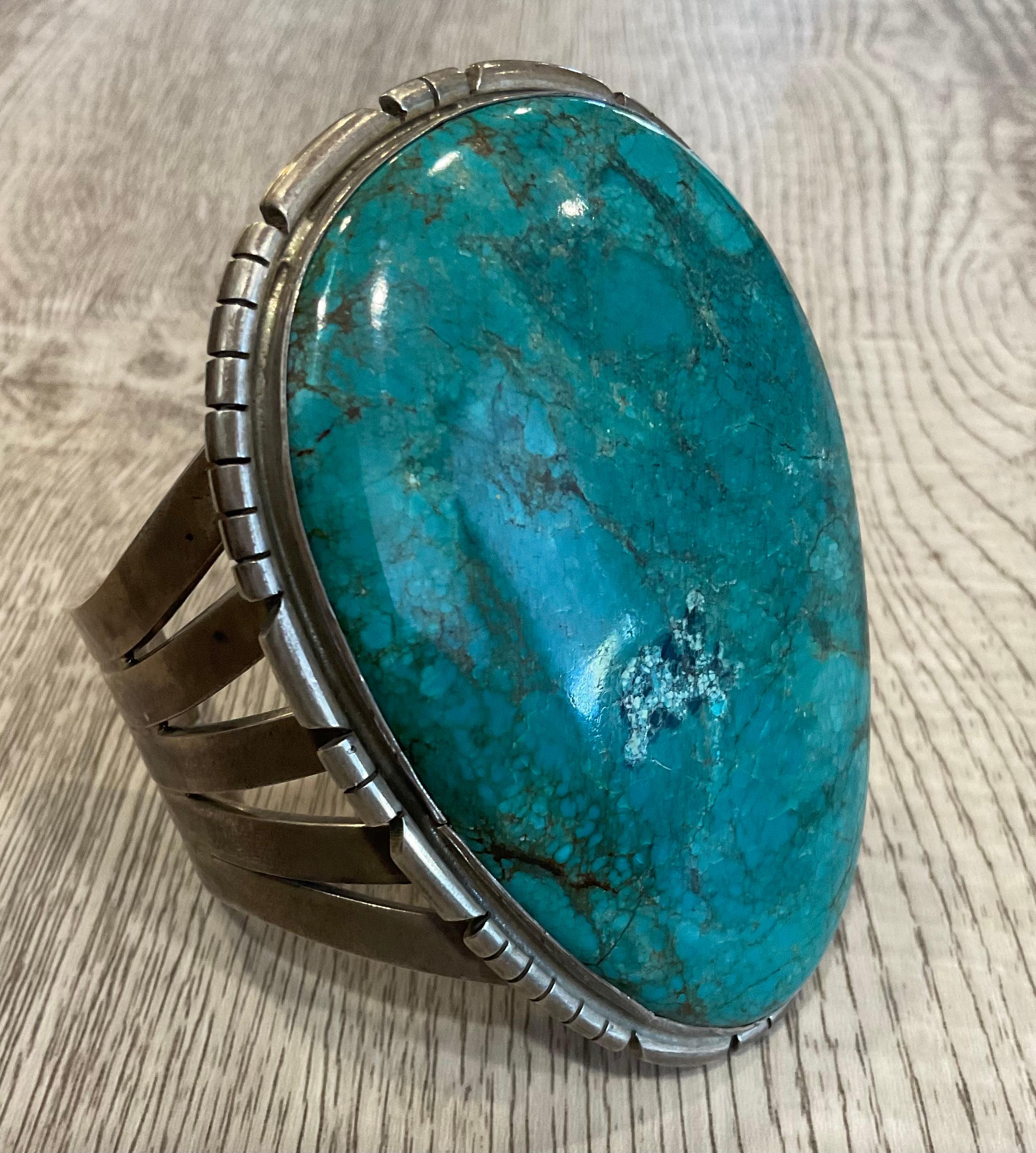 This Roy Buck sterling silver cuff boasts the largest piece of turquoise I've represented yet. The slab measures 3