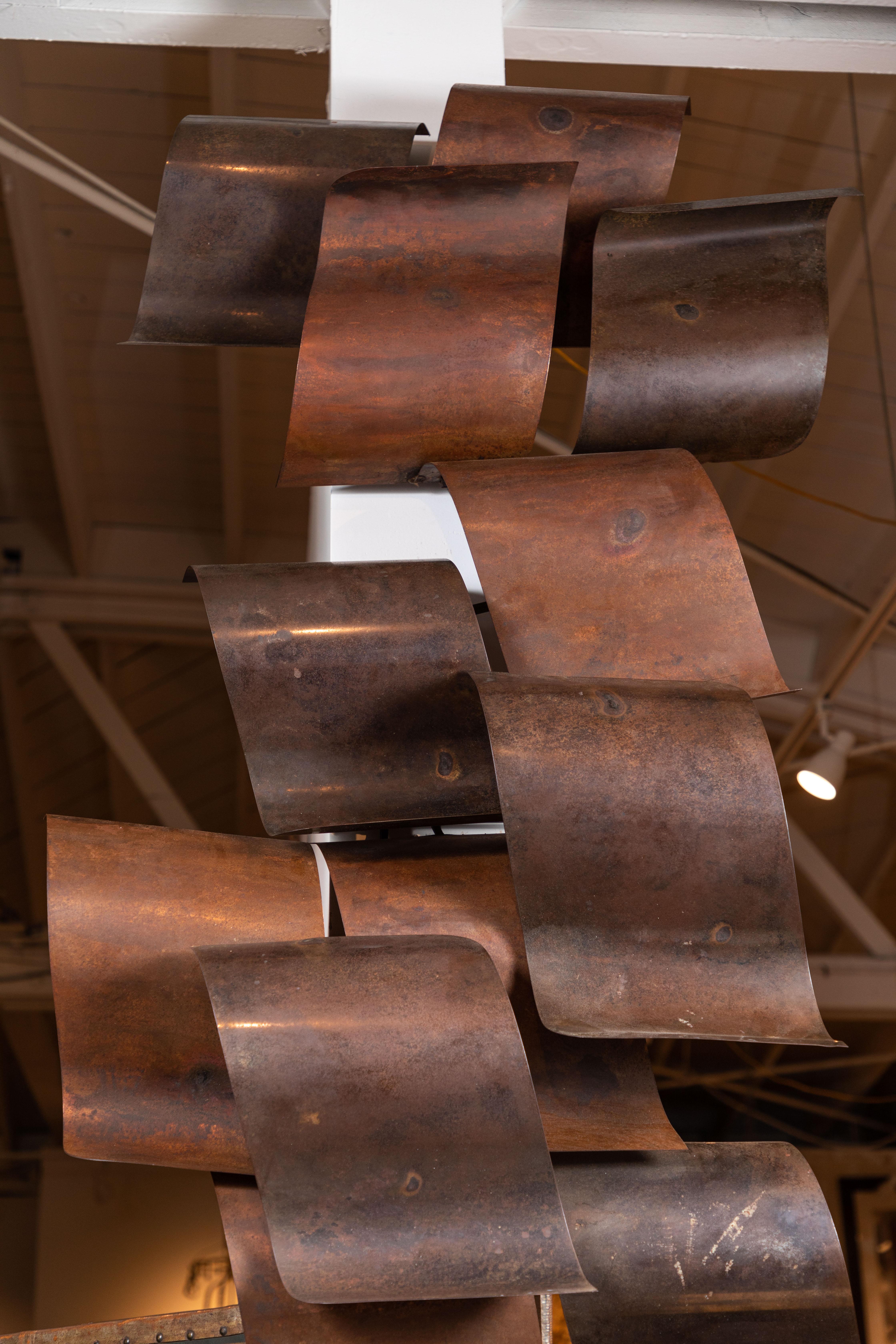 A fabulous, monumental, 1970s bronze and iron, abstract, undulating, cascading wall sculpture.