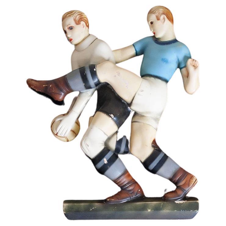 Ceramic bas-relief depicting soccer players LENCI production signed Enrica Robecchi 1930s.
Enrica Robecchi has worked with the Turin-based 