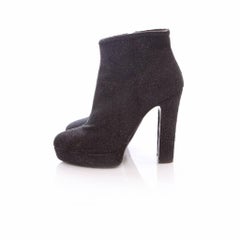 Enrico Antinori, black glitter ankle boots.