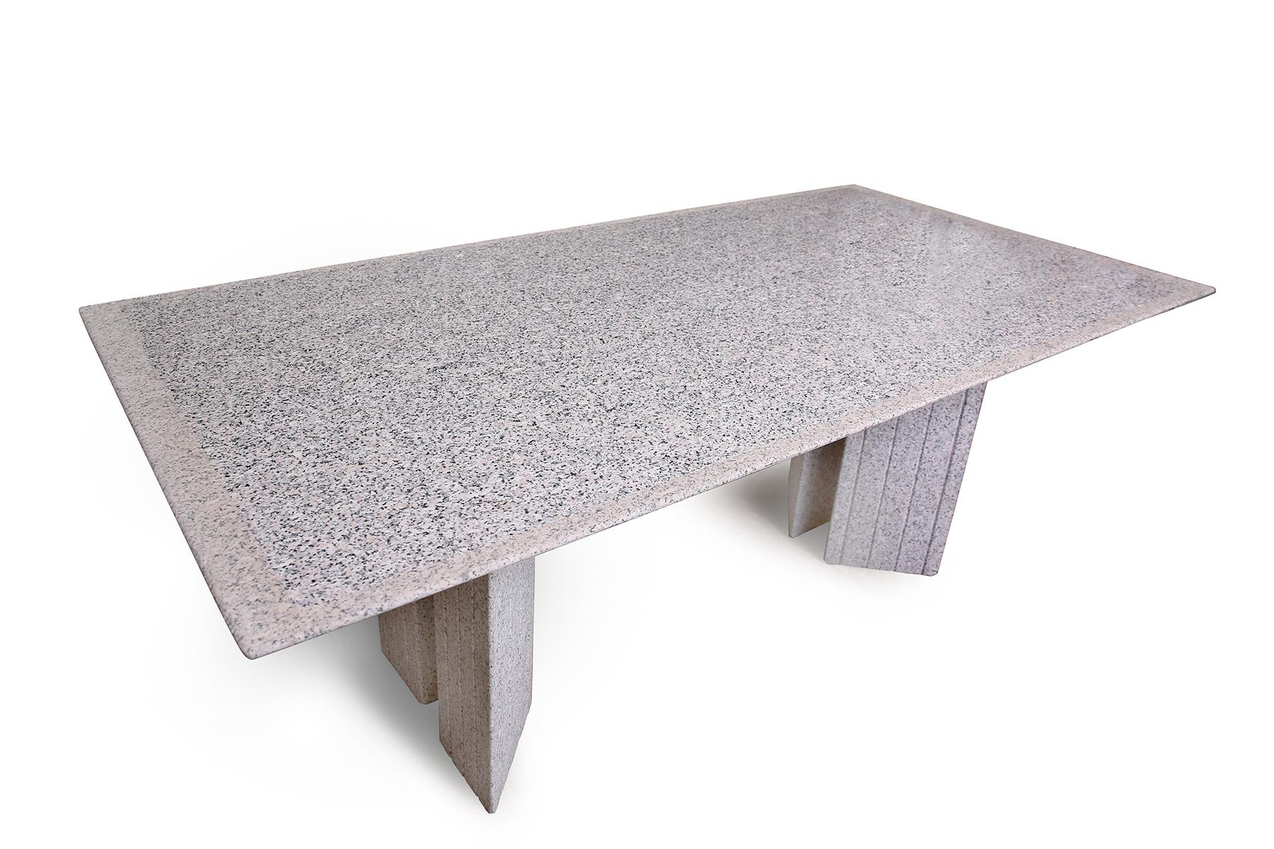 Enrico Baleri for Knoll Studio mega table, circa early 1980s. This table's form was meant to evoke ancient megaliths and is done in polished and honed Sardinian Beta granite. This piece was purchased from a Knoll VP and is in excellent original