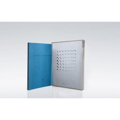 Enrico Castellani – plexiglas box containing an everted stainless steel plate