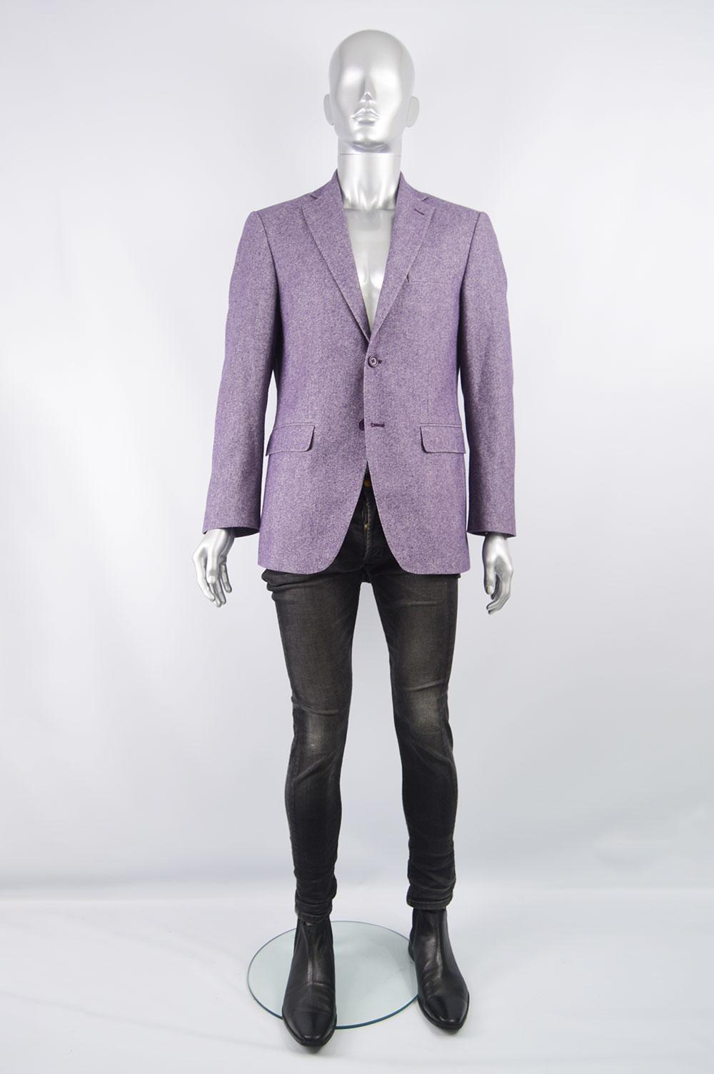 A stylish preowned Enrico Coveri blazer jacket in a purple and white virgin wool and soft cotton blend woven fabric. Made in Italy with a hand set lining, single breasted buttons and a double vent to the rear. 

Size: Marked 50 which is roughly a