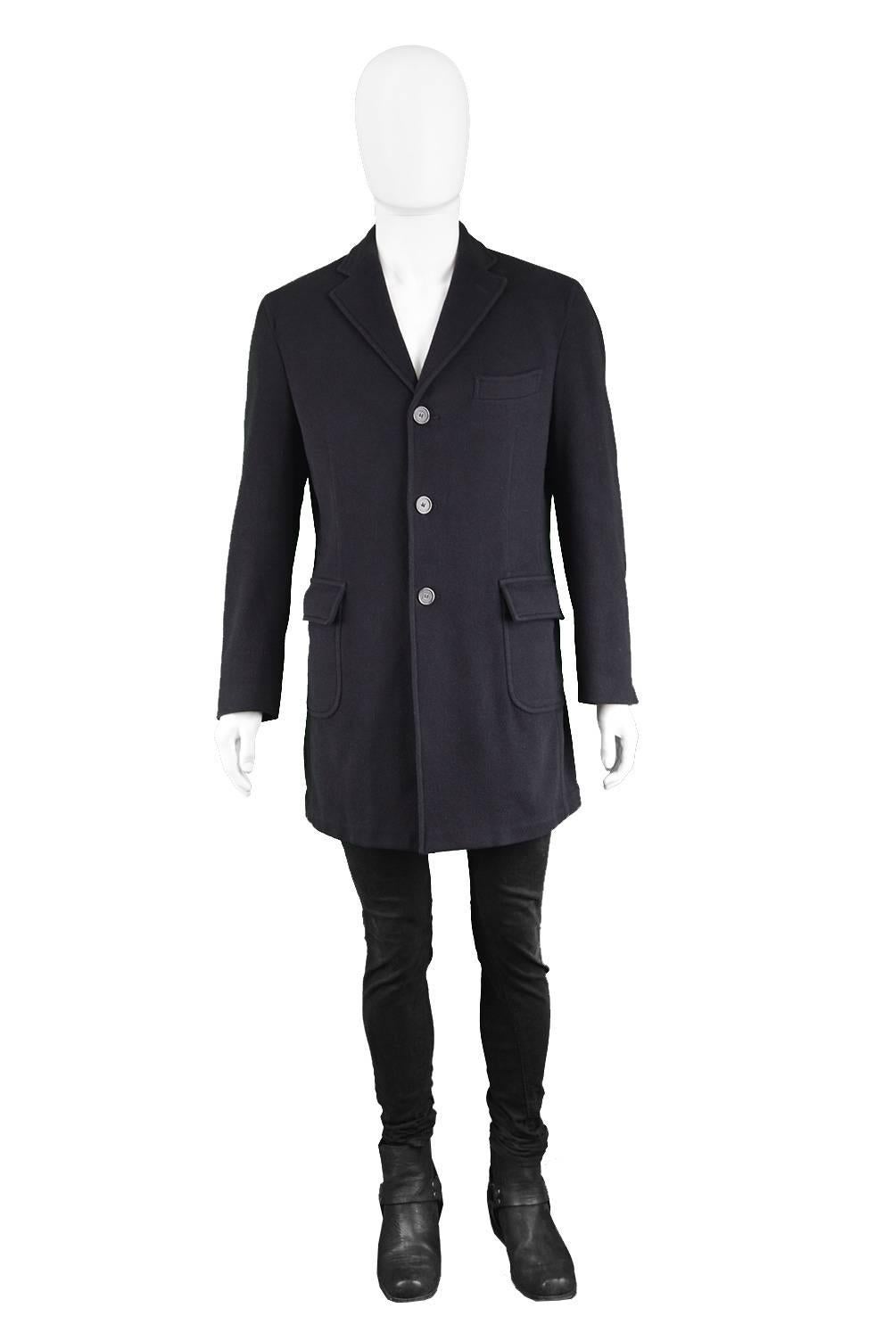 Enrico Coveri Men's Vintage 1990s Black Wool & Cashmere Hand Finished Over Coat

Size: Marked 50R which is roughly a men's Medium. Please check measurements.
Chest - 42” / 106cm (allow a couple of inches room for movement)
Waist - 36” / 91cm
Length