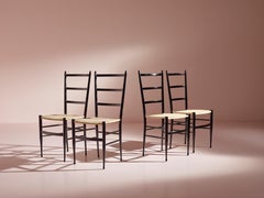 Enrico Delmonte set of four "Gobbetta" chairs, Chiavari, Italy, 1960s