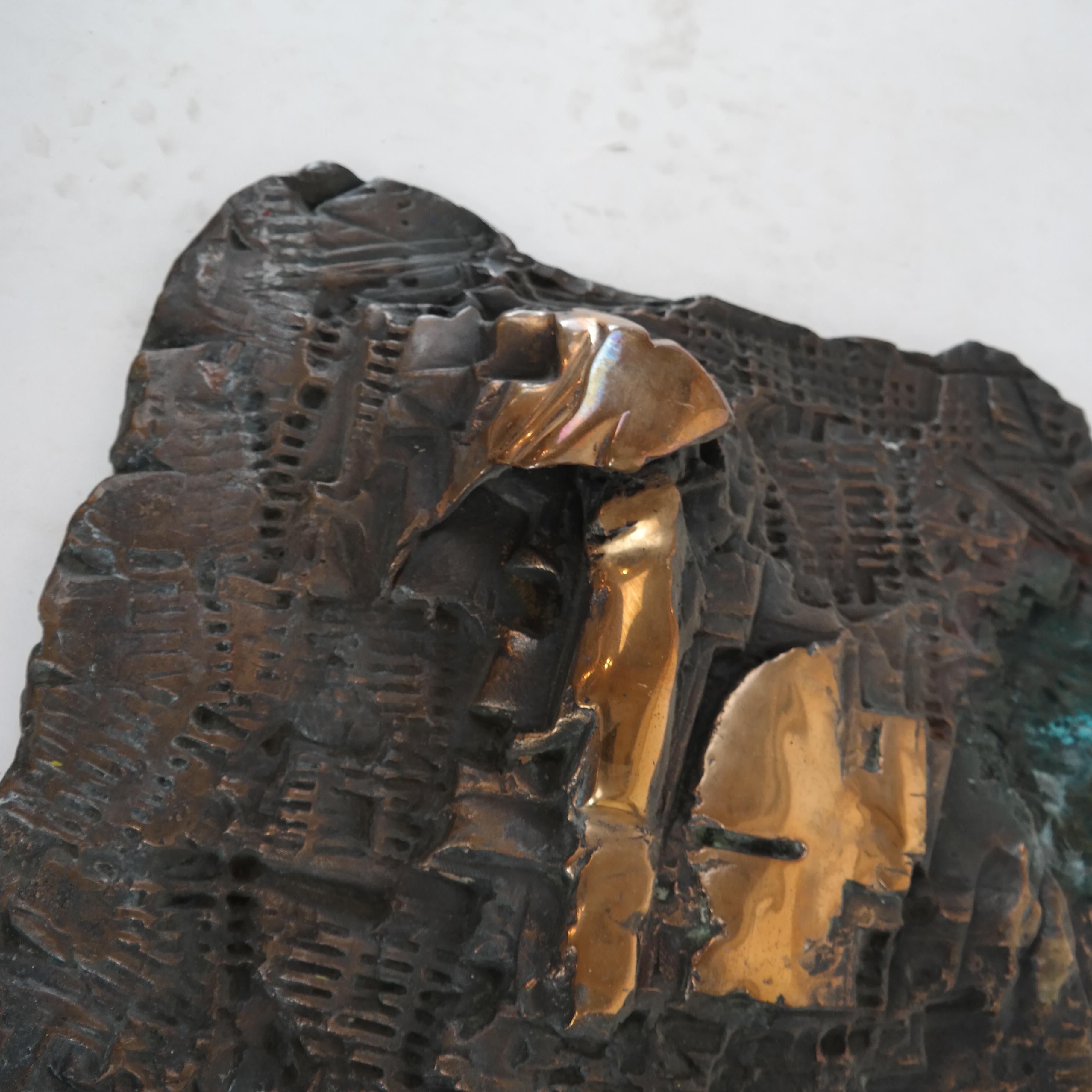 A Brutalist Bronze Sculpture wall hanging. With a great patina and rough and polished textured bronze. From small edition of 6. Signed. 

Enrico Donati (1909 – 2008) was an Italian-American Surrealist painter and sculptor whose work also bore