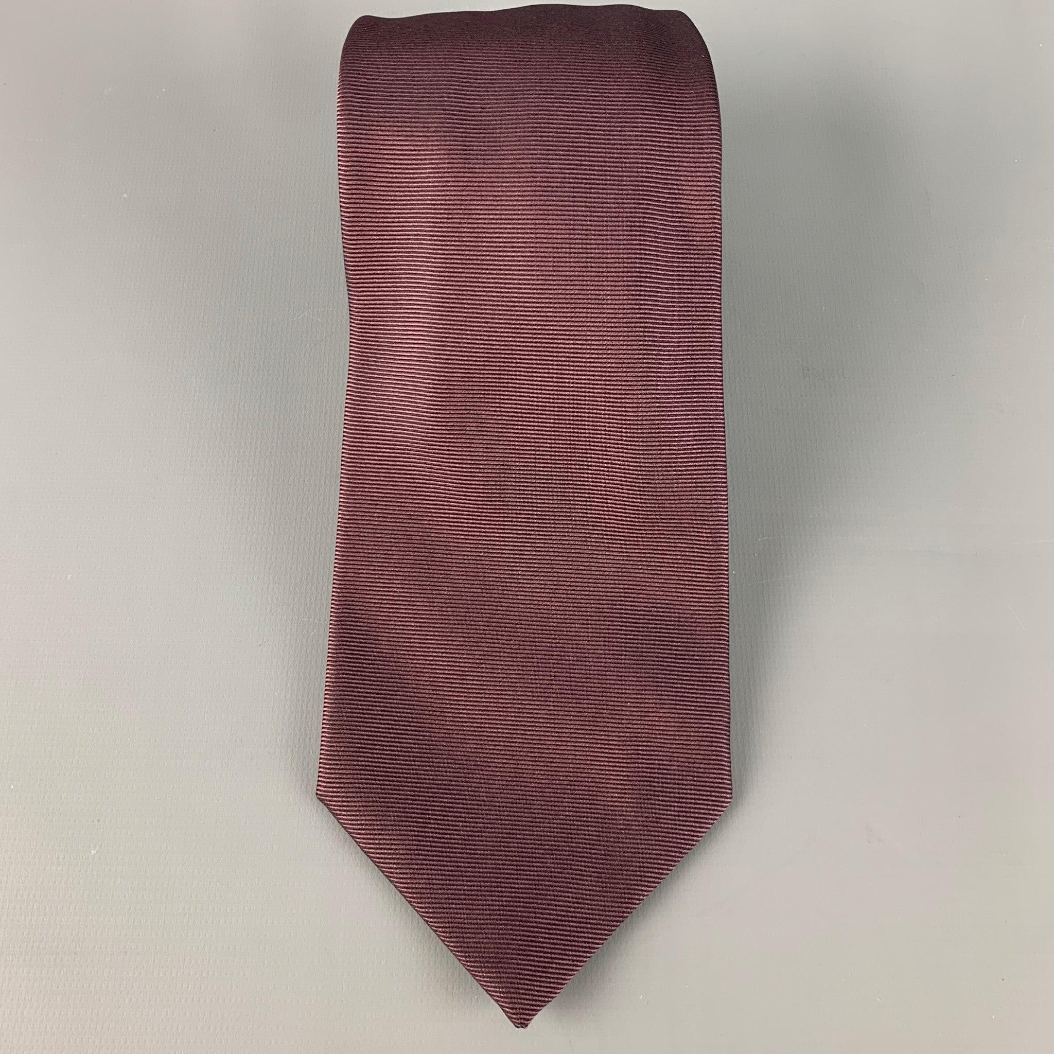 ENRICO ISAIA
tie in a brown silk twill. Handmade in Italy.Very Good Pre-Owned Condition. 

Measurements: 
  Width: 3.5 inches Length: 60 inches 
  
  
 
Reference: 126558
Category: Tie
More Details
    
Brand:  ISAIA
Color:  Brown
Fabric: 