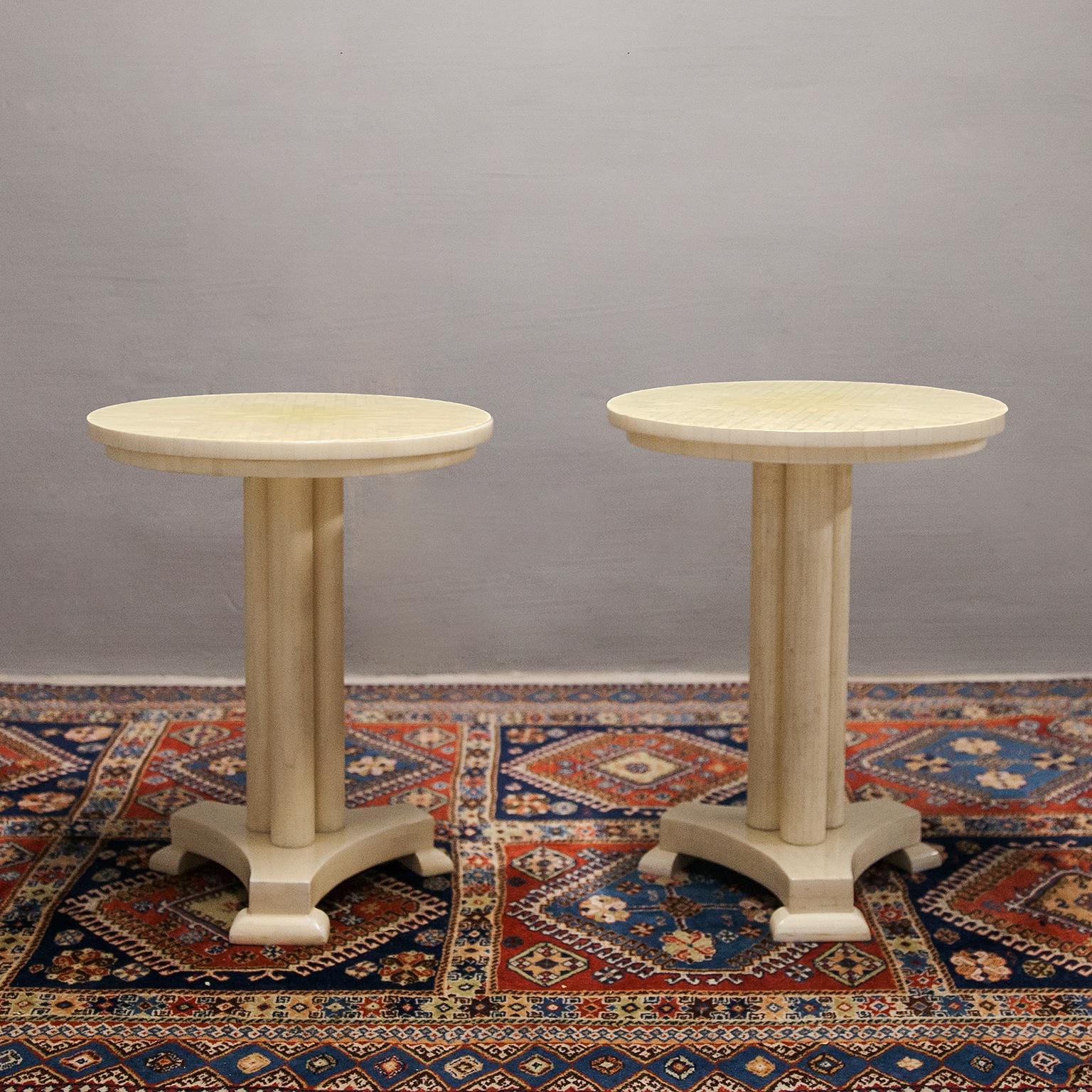 Neoclassical three-column side table with stepped top and interesting mosaic-like bone parquet. Designed by Enrique Garcel for Pilati Interior in Germany. Marked with brass plate at the bottom. Very good vintage condition with slight variations in