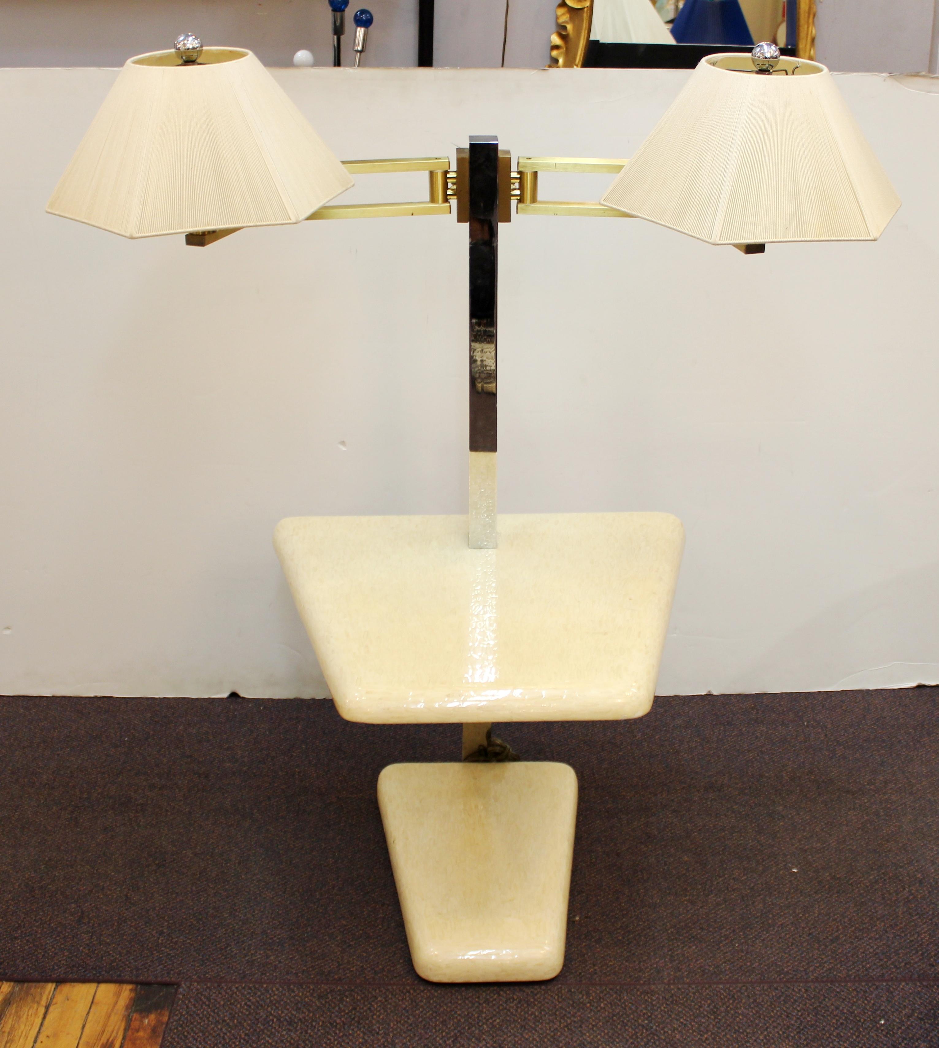 Modern side table or end table with attached double lamps and a tessellated bone surface designed by Enrique Garcel in the 1970s. The lamps come with lampshades and are articulated. In great vintage condition with some age-appropriate wear.