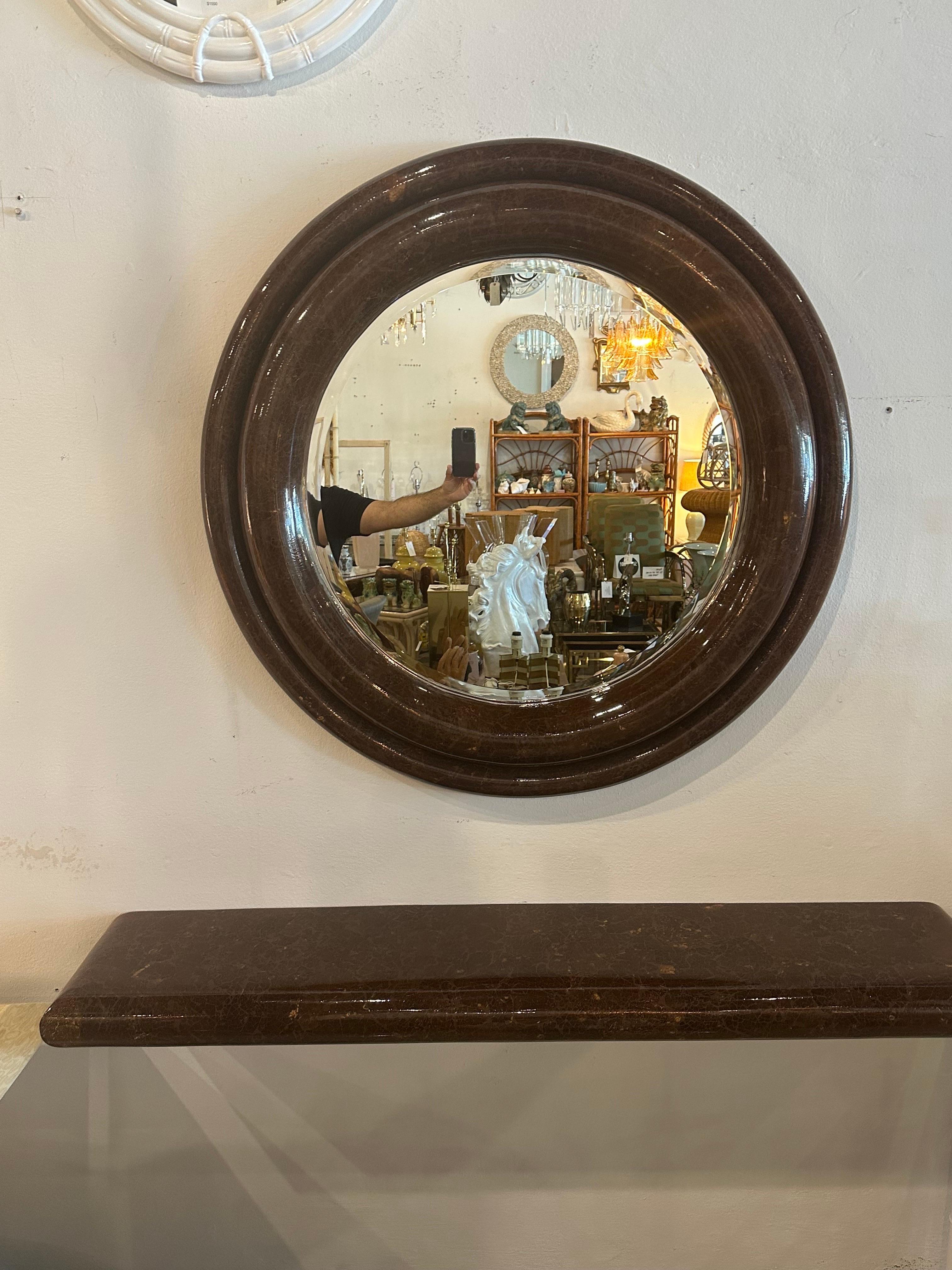 Lovely vintage Enrique Garcel, Made in Columbia coconut shell lacquered wall mount console table shelf with matching round mirror. Comes with mounting supplies for the wall mount console. Mirror dimensions: 42 D x 4 D. Wall shelf table dimensions: