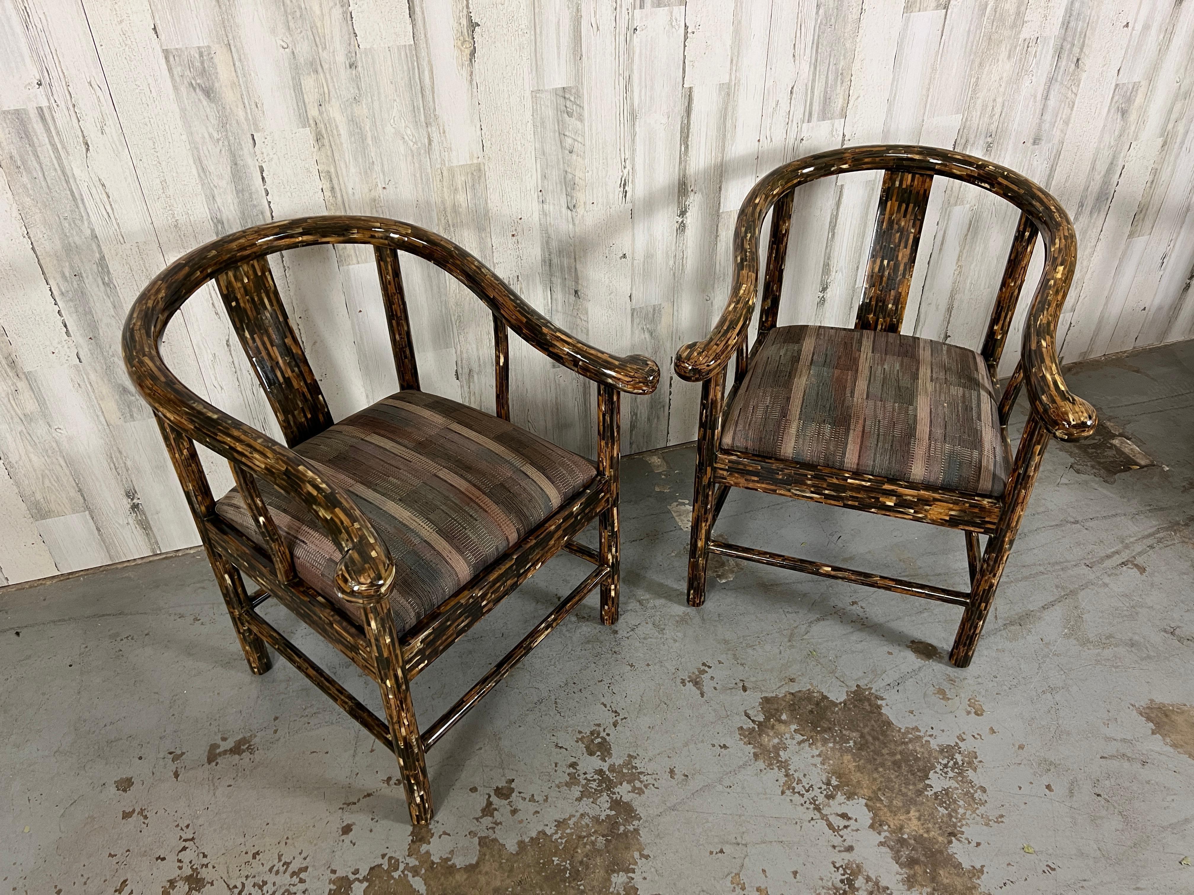 Enrique Garcel Tessellated Horn Dining Chairs. These chairs feature a horseshoe shape curved back with cushioned seats. This set is very rare to find. 