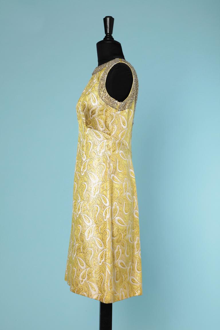 Ensemble ( coat and dress) in yellow brocade and embroideries 1960 1