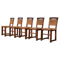 Ensemble de 5 chaises en chêne et jonc dans le goût de Charles Dudouyt 1950's