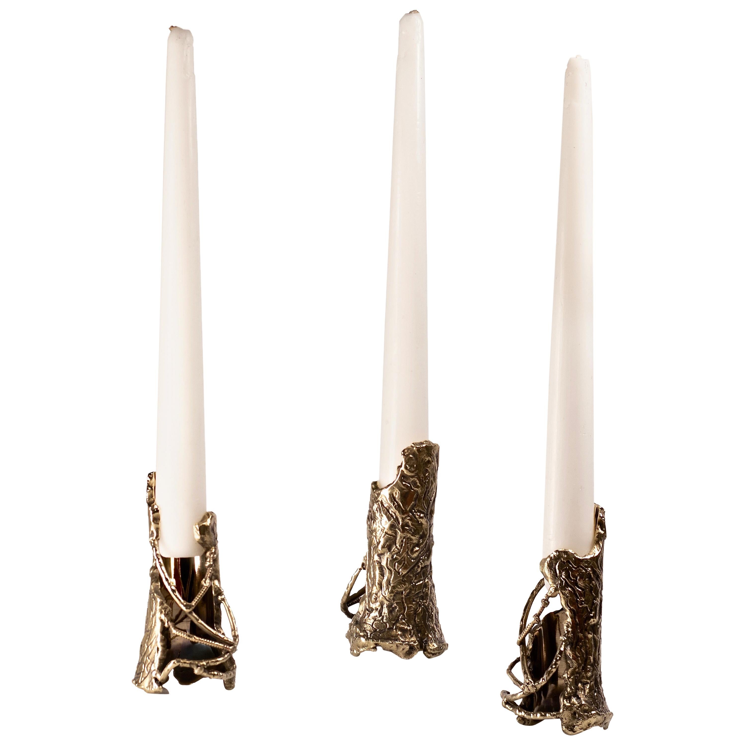 Ensemble of Brass Hand-Sculpted Candleholders by Samuel Costantini For Sale