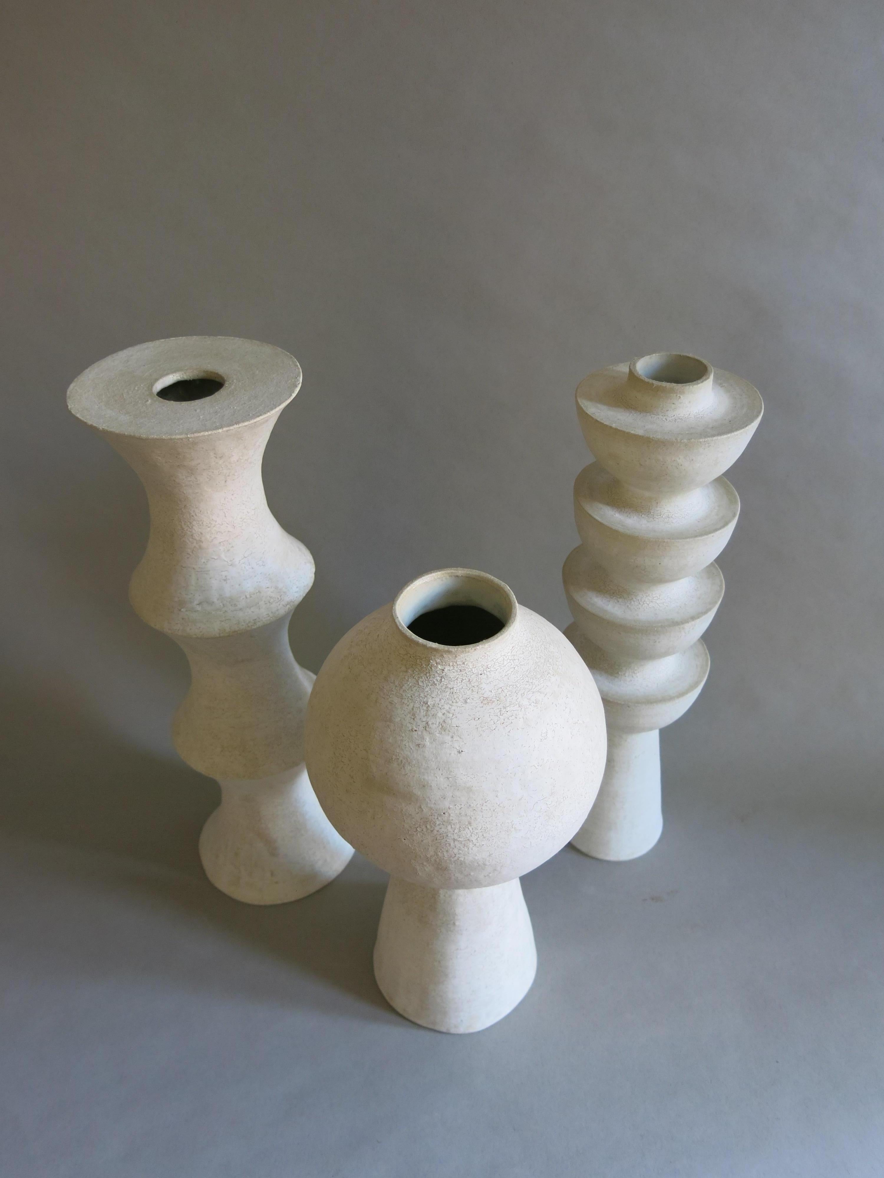 Ensemble of four ceramic vases by John Born

1. Fledgling vase
10.75 x 4.5 x 4.5”
27 x 11.5 x 11.5 cm

2. RDWD vase
14.75 x 4 x 4”
37.5 x 10 x 10 cm

3. ORB vase
12 x 6 x 6”
30.5 x 15.25 x 15.25 cm

4. BMB vase
15 x 4.5 x 4.5”
38 x