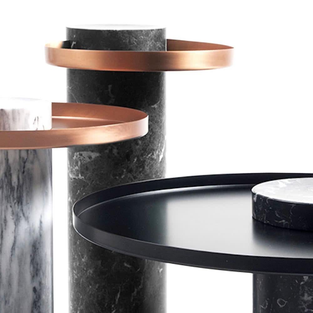 Marble contemporary coffee table - Sebastian Herkner

The Salute table exists in 3 sizes, 3 different marbles for the column and 4 different finishes for the tray for a virtually endless number of configurations. In addition, Salute can be made