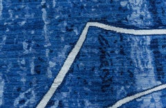 Tapis « Enso » conçu par Nader Bolour : motif abstrait moderne représentant des cercles aux traits de pinceau