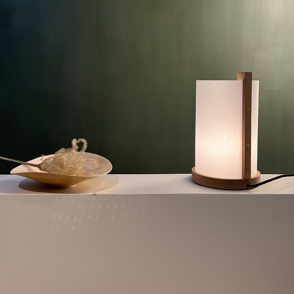 The ENSO table lamp is the new add-on to the ENSO pendant. ENSO is based on traditional Japanese wood joinery using the best materials and handcraft.

With a modern take on the traditional Japanese lanterns, the lamp shade is constructed with