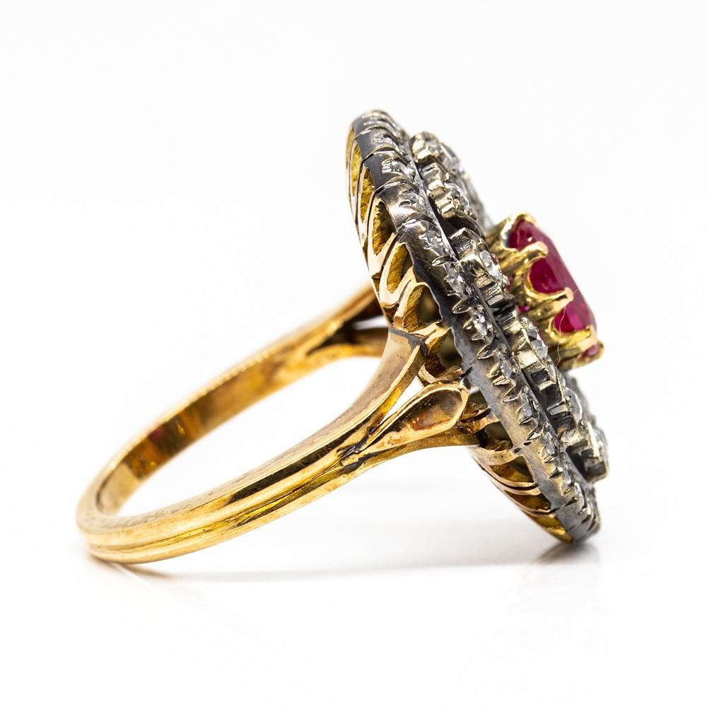 This one of a kind ring is centered with a natural oval cut Burma ruby that weighs 1.02ctw.
Handmade in 18k gold, this fabulous piece of jewelry showcases 60 old mine cut diamonds of H-VS2 quality that weigh 1.10ctw.
This fabulous ring can be