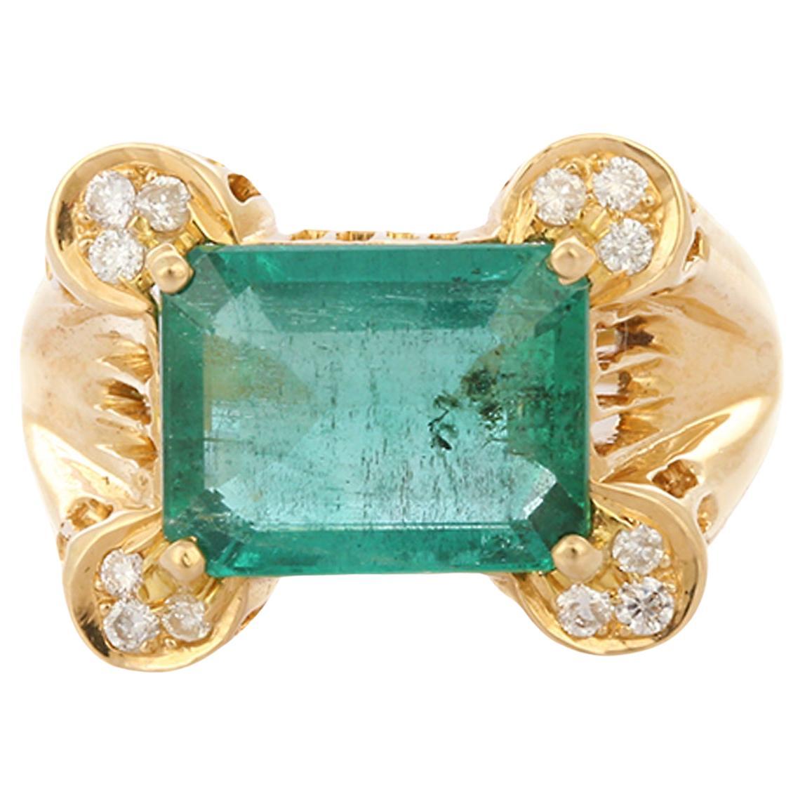 For Sale:  Enticing 3.94 Ct Green Emerald and Diamond Set in 18K Yellow Gold Cocktail Ring