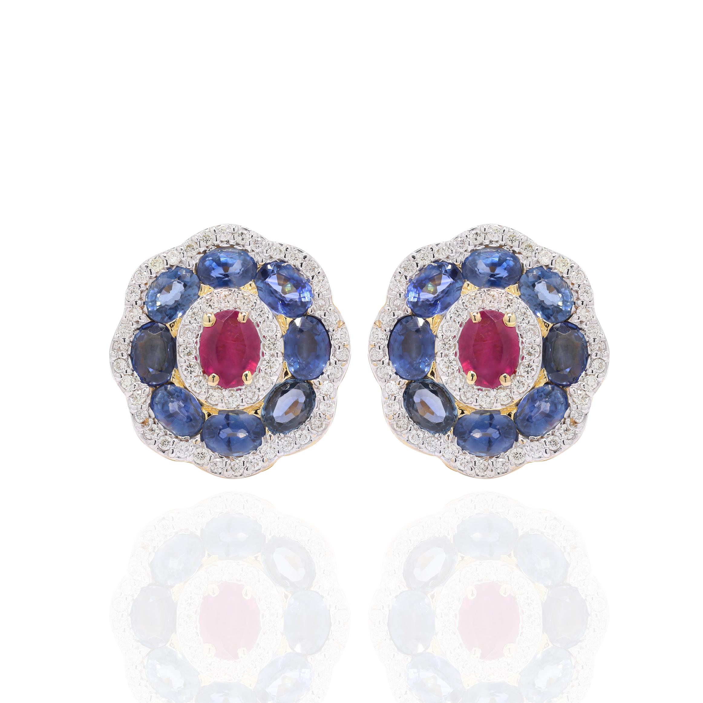 Earrings create a subtle beauty while showcasing the colors of the natural precious gemstones and illuminating diamonds making a statement.
Oval cut ruby, sapphire and diamond earrings in 18K gold. Embrace your look with these stunning pair of